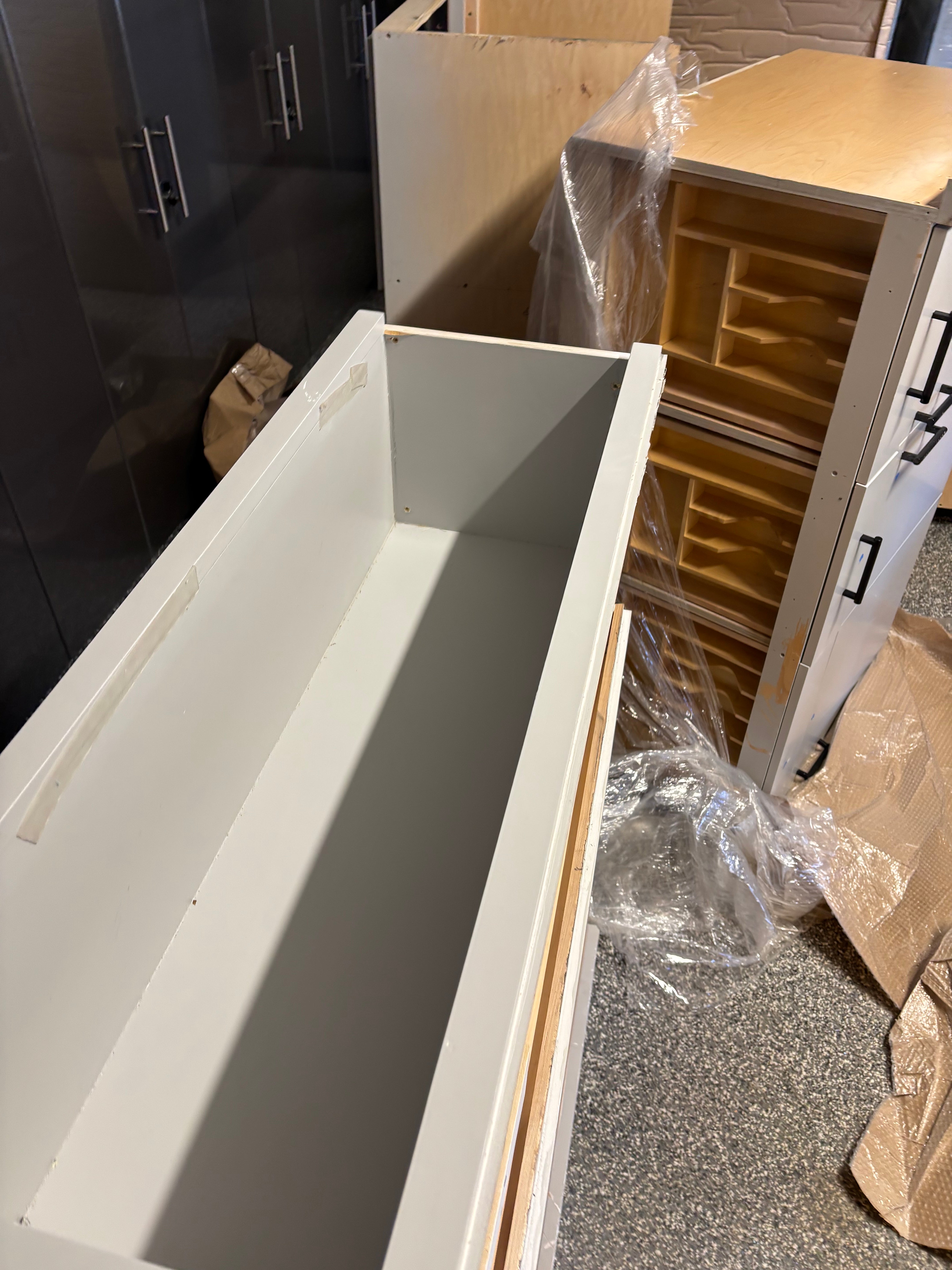 Custom Modern Light Grey Pantry with White Stone Countertops and Stainless Steel Sink