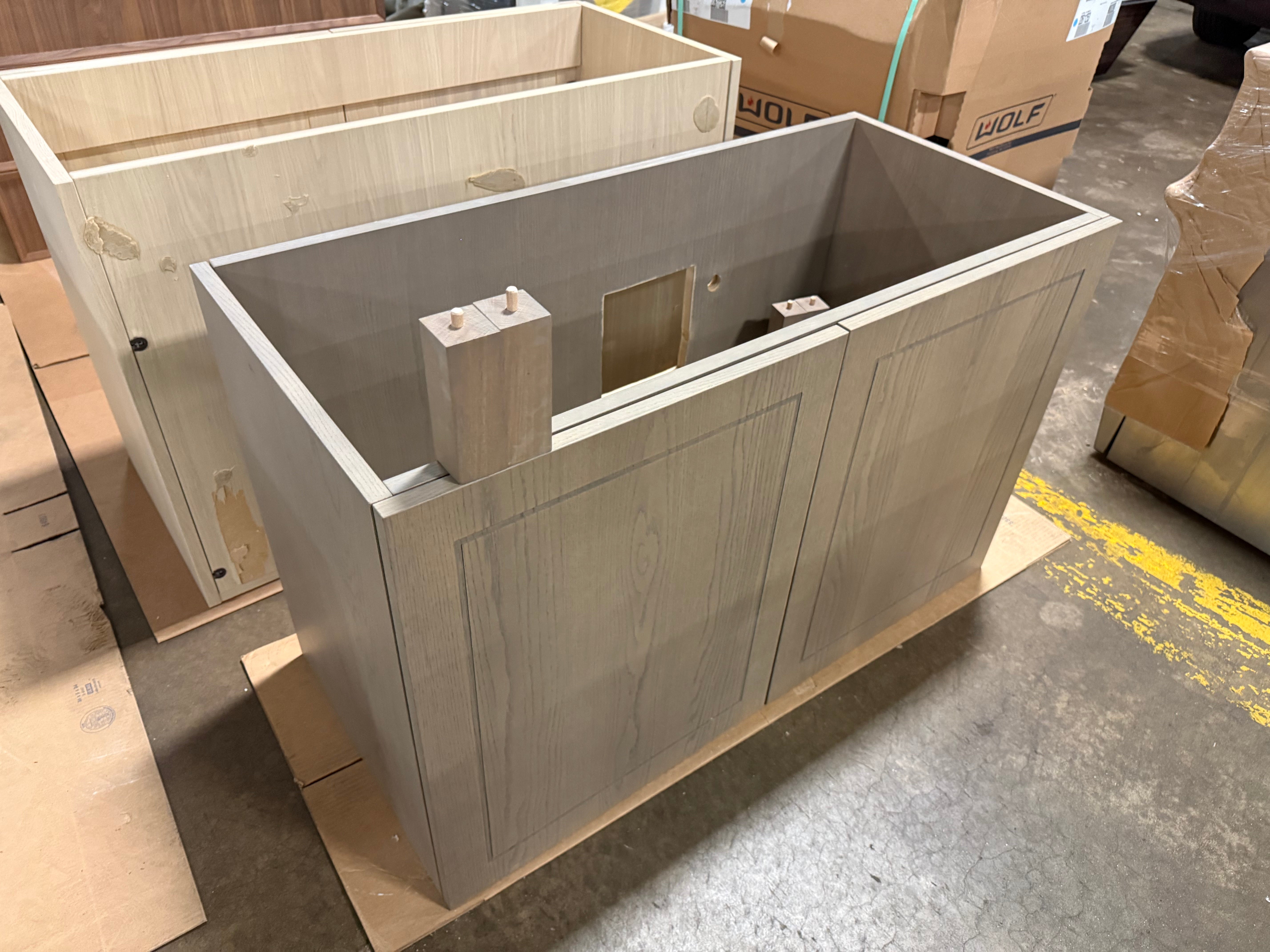 Close up view of the rich natural wood grain finish and soft close drawer detail on the DOCA 43 inch vanity