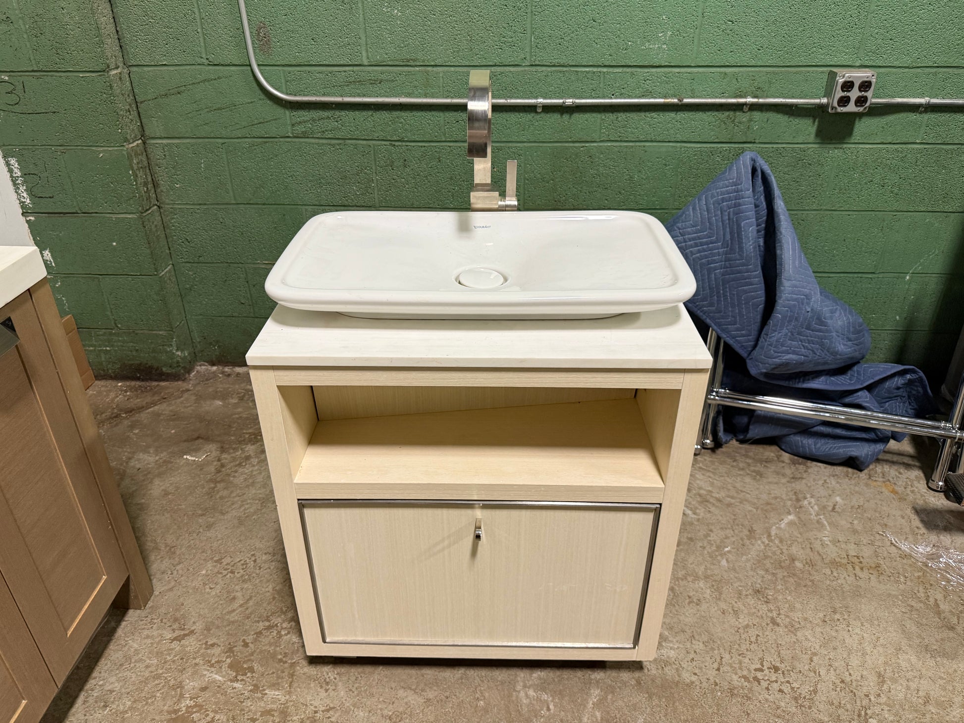 Custom 27 inch natural oak freestanding single bathroom vanity with white Duravit sink and single handle faucet