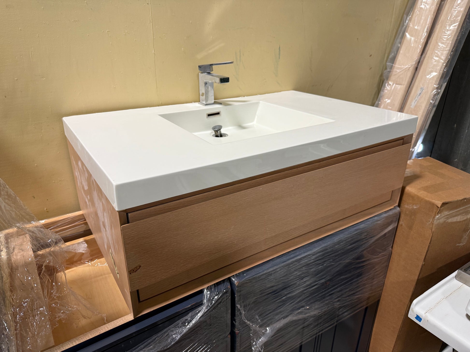 Custom modern 36 inch floating light oak single bathroom vanity with integrated white sink and faucet