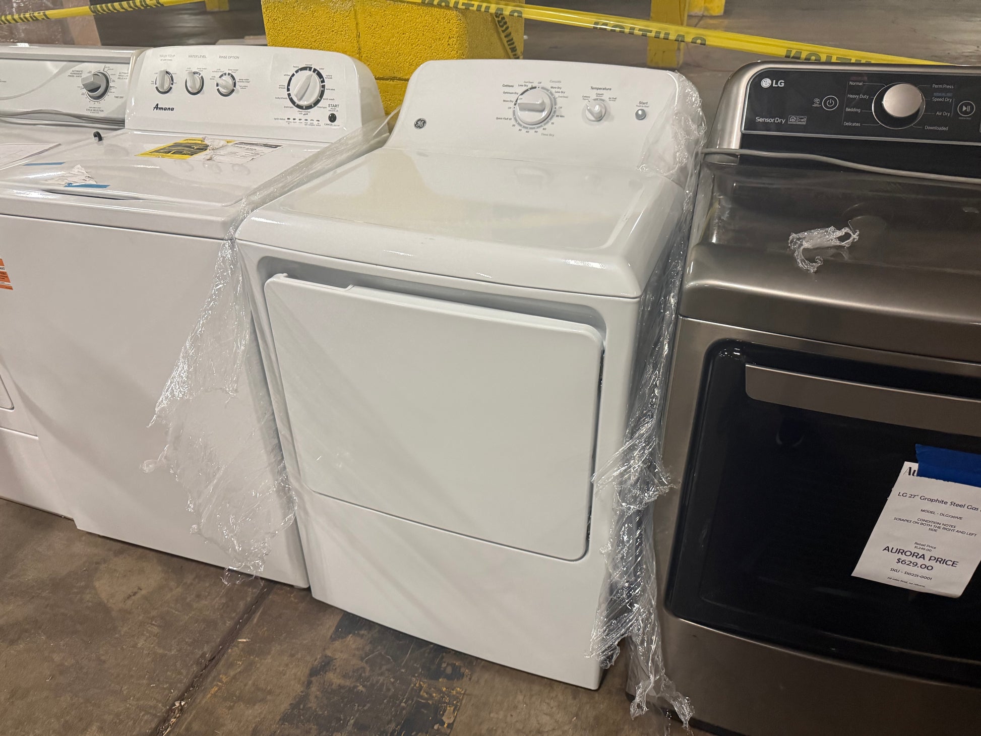 GE GTX22GASKWW 6.2 cu ft shallow depth gas dryer in white featuring a top rear mechanical control console