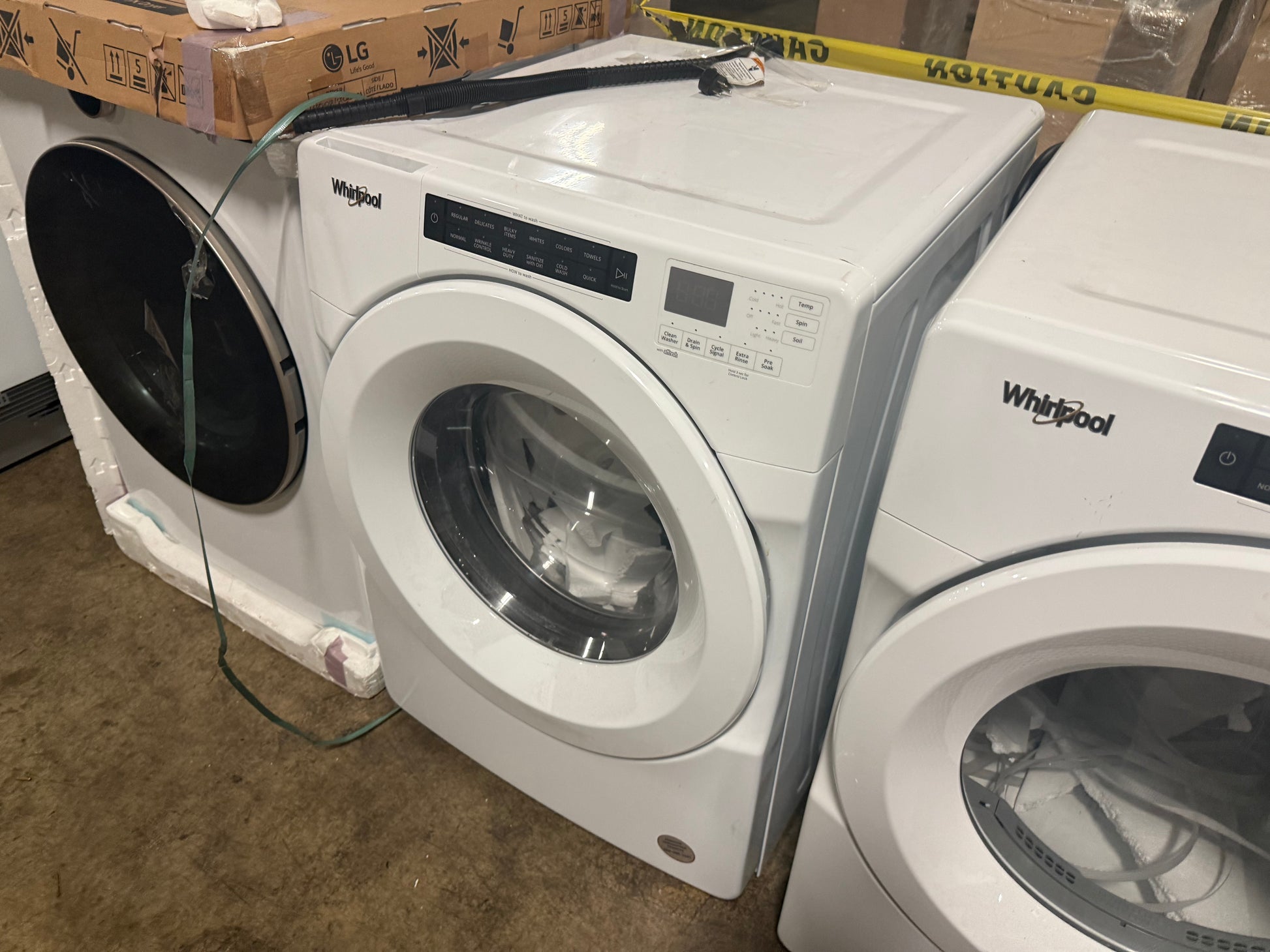 Whirlpool WFW560CHW 4.3 cu ft front load washer in white with intuitive touch controls and chrome door trim
