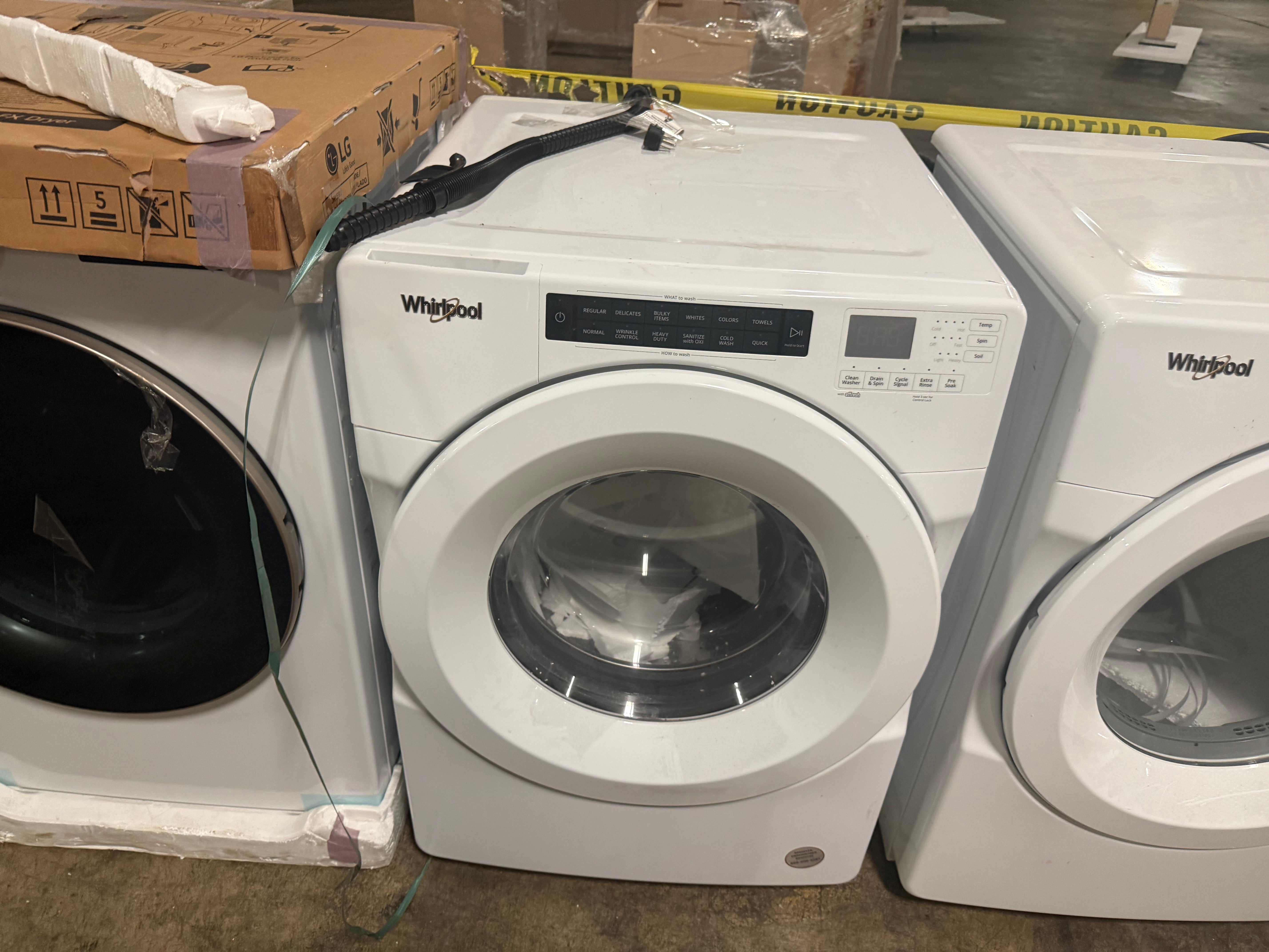 Interior view of the Smooth Wave stainless steel drum inside the Whirlpool WFW560CHW front load washing machine