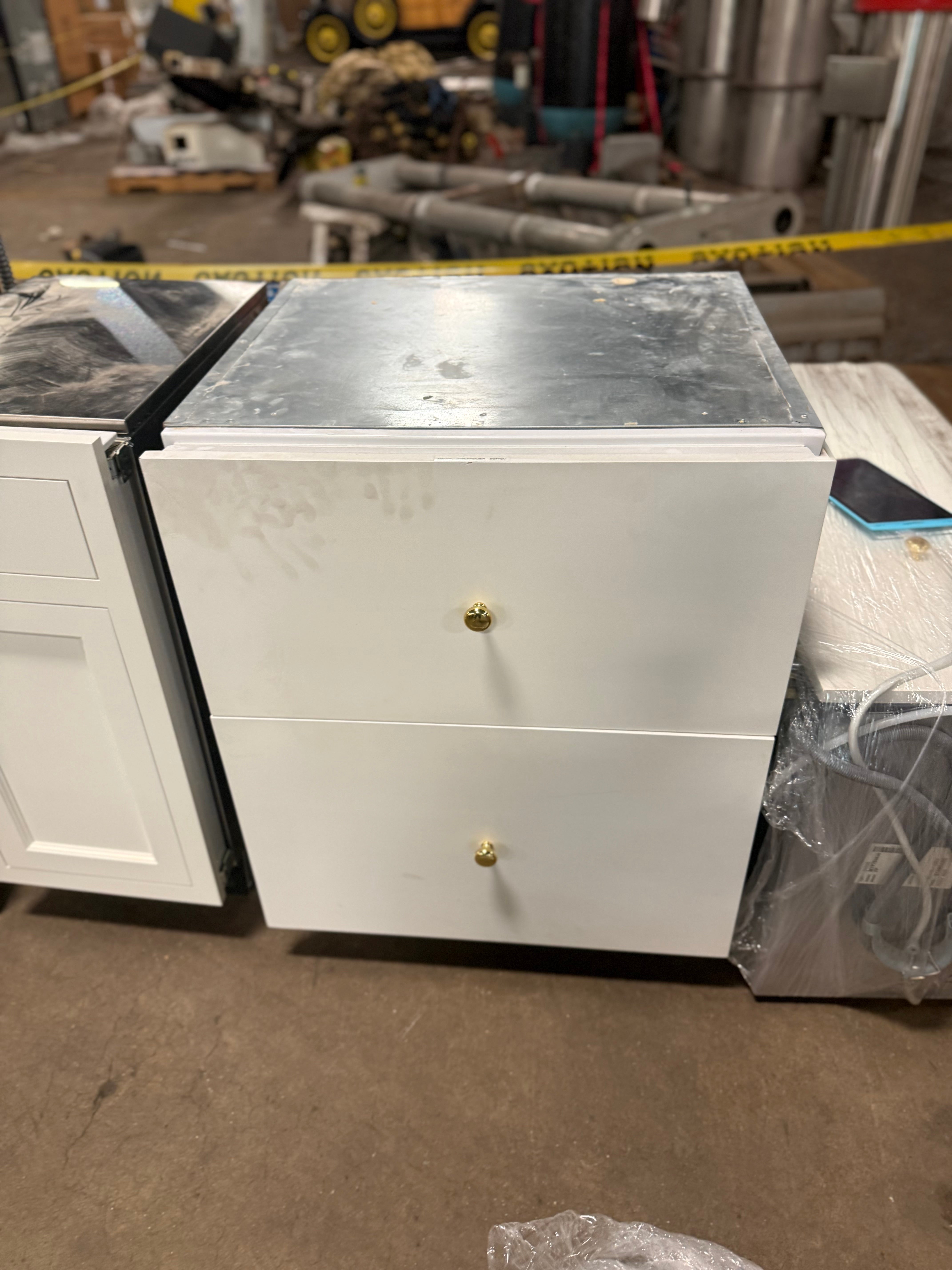 Sub-Zero panel ready pull out refrigerator and freezer drawers in kitchen island