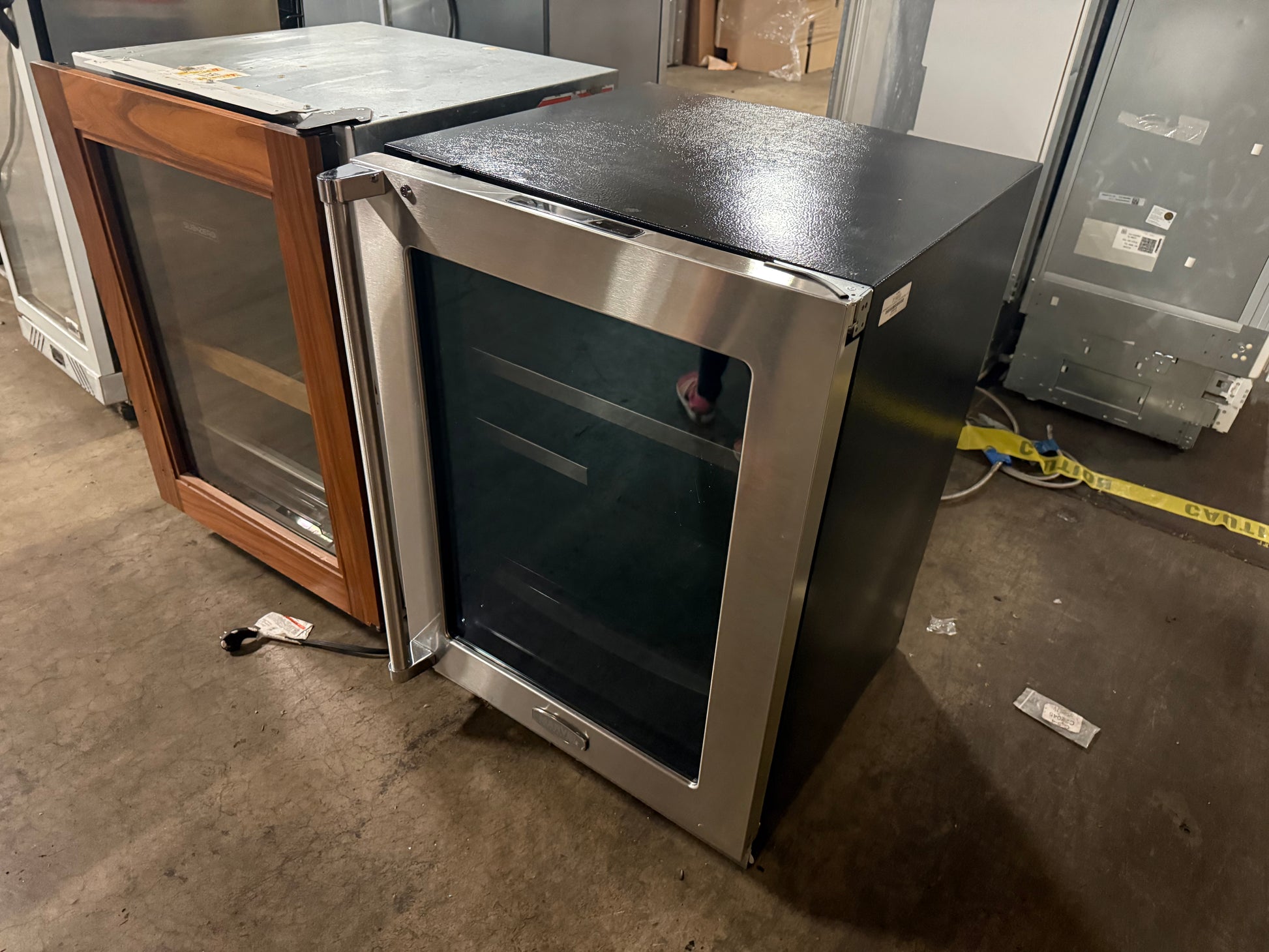 Under-counter luxury drink cooler with stainless steel frame and glass door