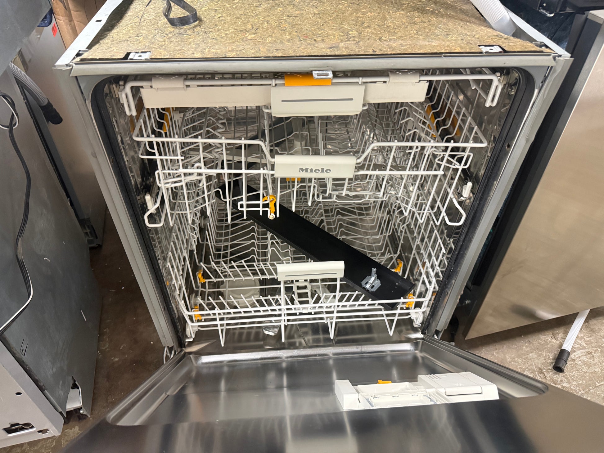 Interior view of Miele G5575SCVI showing 3D MultiFlex tray and adjustable racks