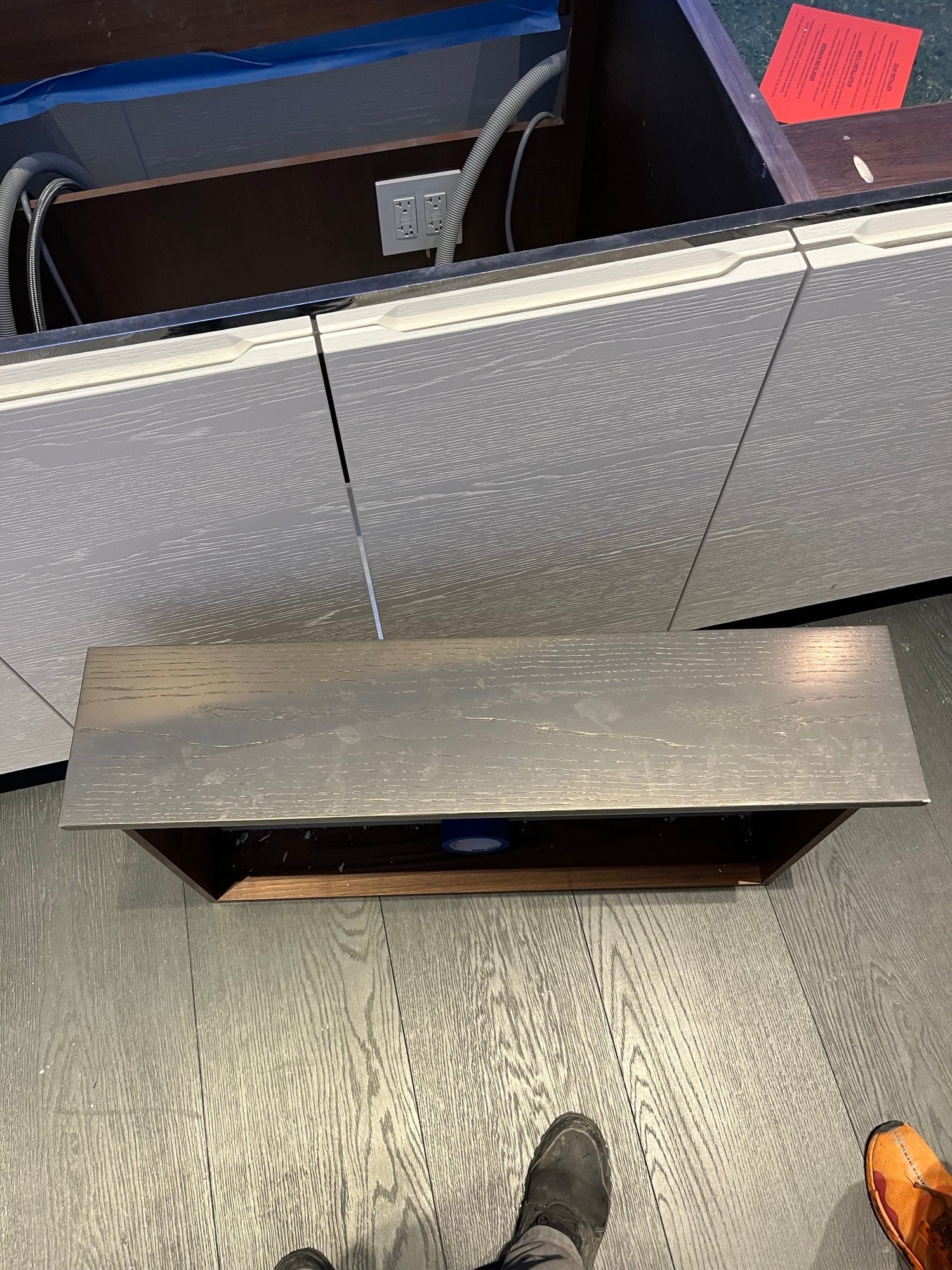 Modern White and Brown Wood Veneer Kitchen with Waterfall Island, Marble Countertops & Miele Appliances