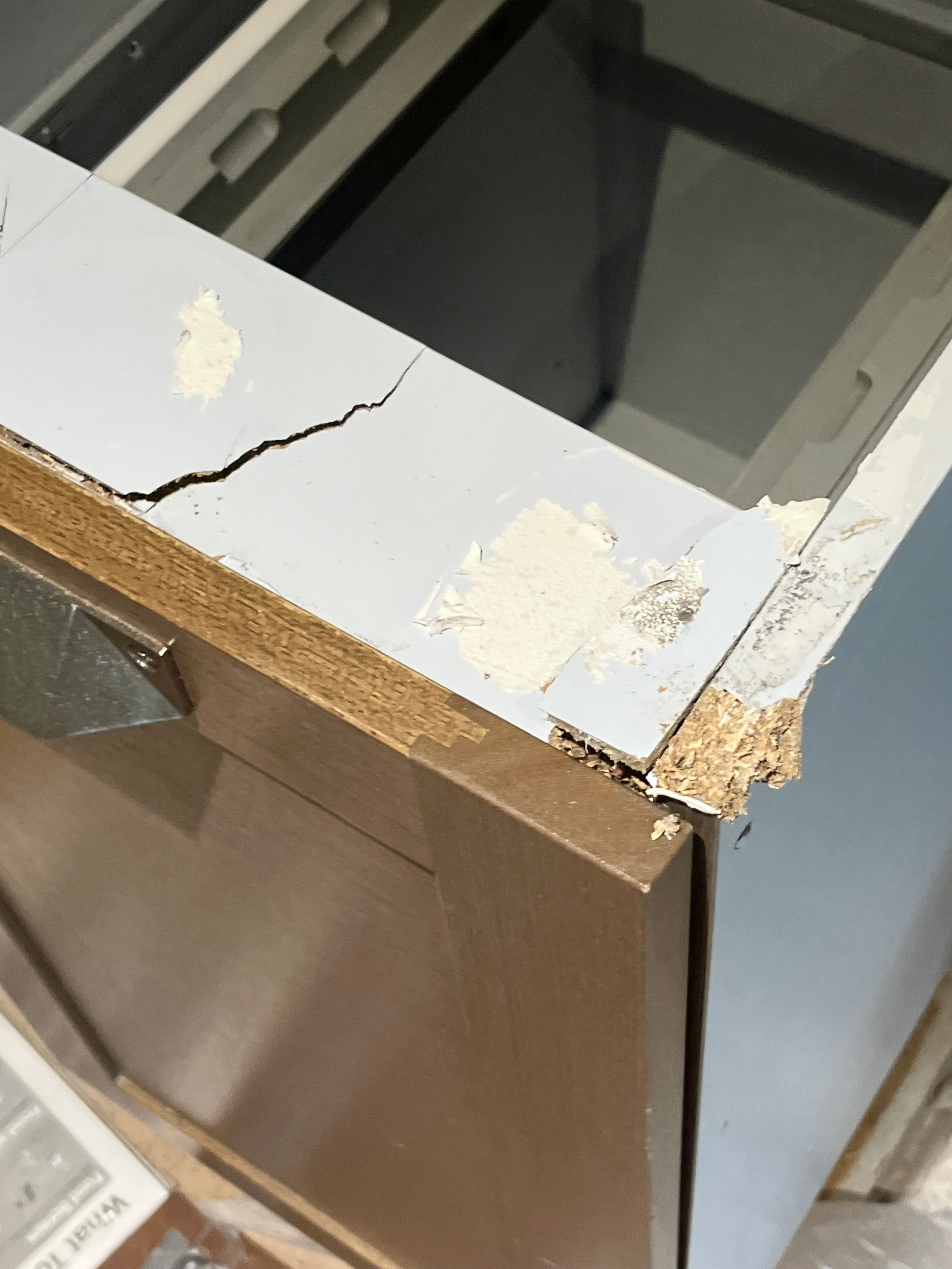 Stevali Brown Oak Transitional Kitchen with Stone Countertops and Luxe Appliances