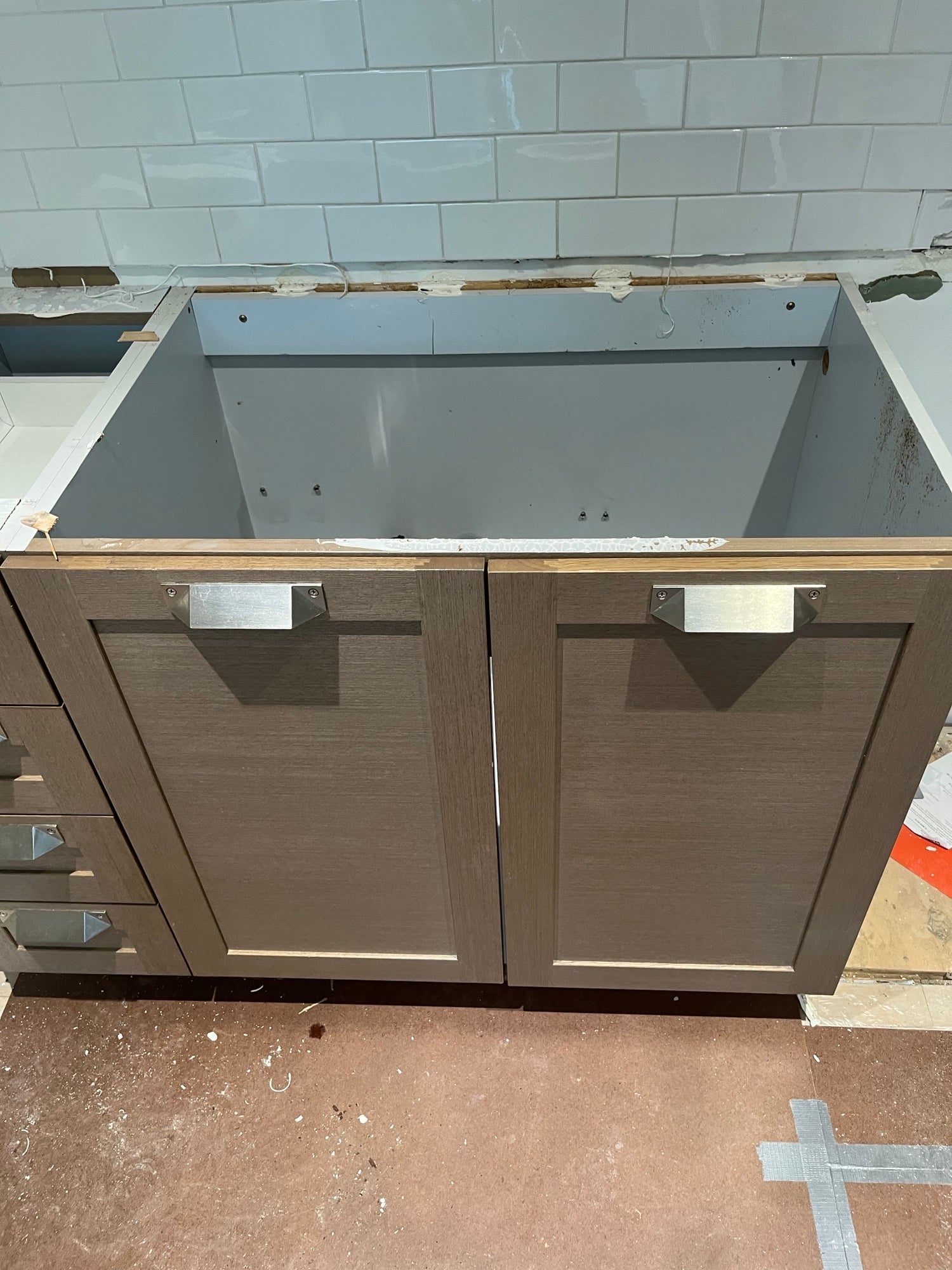 Stevali Brown Oak Transitional Kitchen with Stone Countertops and Luxe Appliances