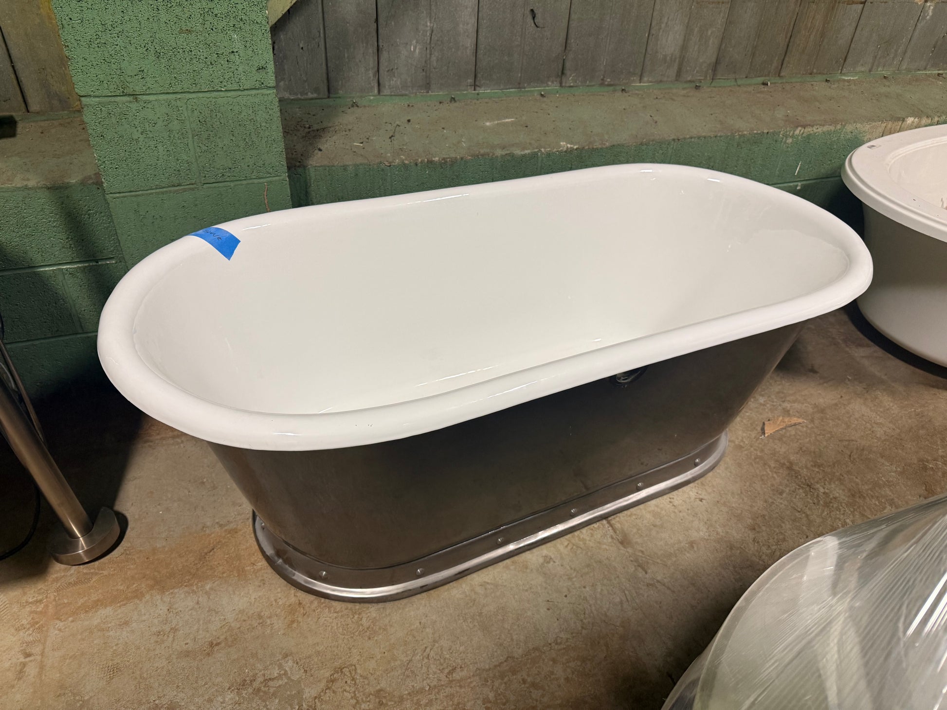 Polished stainless steel 68 inch freestanding soaking tub