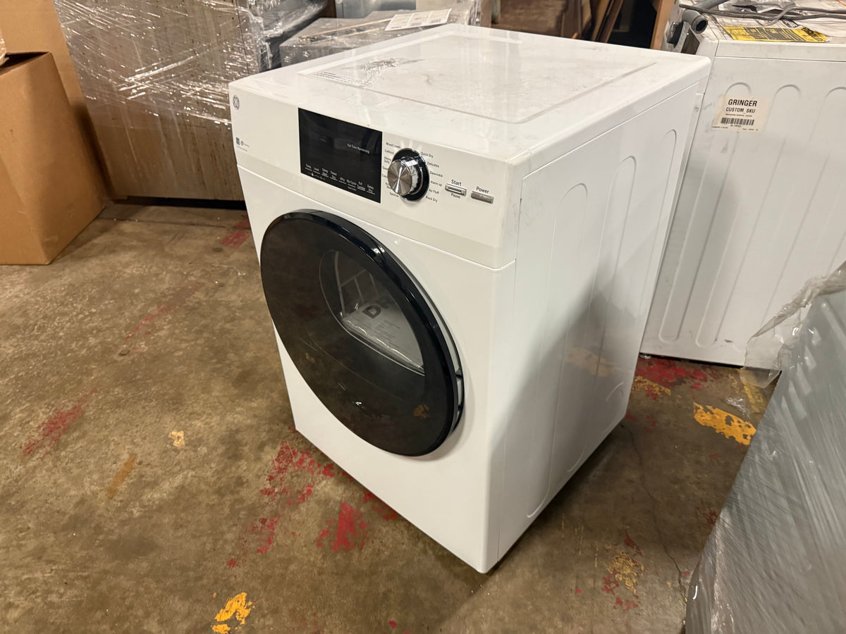 Space saving laundry appliance interior drum and control panel close up