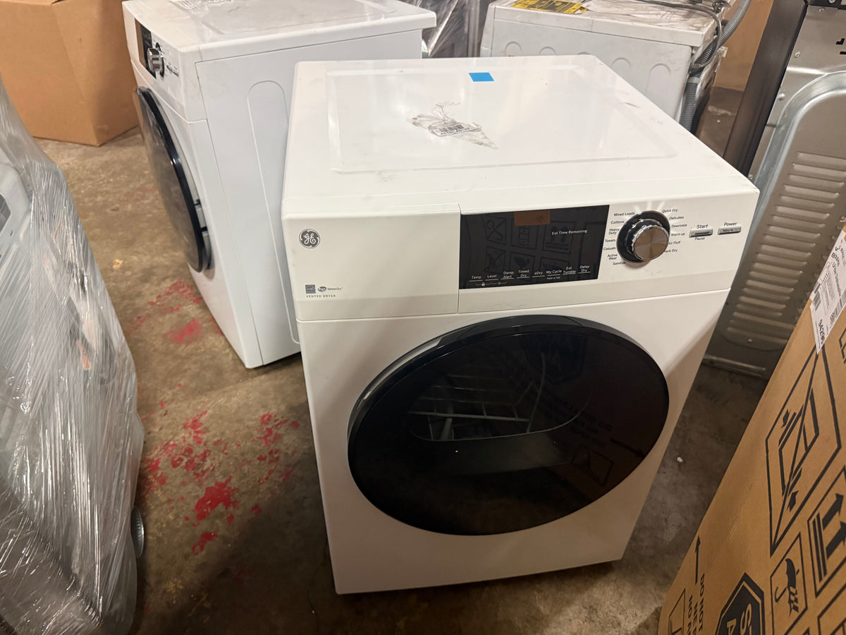 Compact residential clothes dryer with glass door and digital control panel