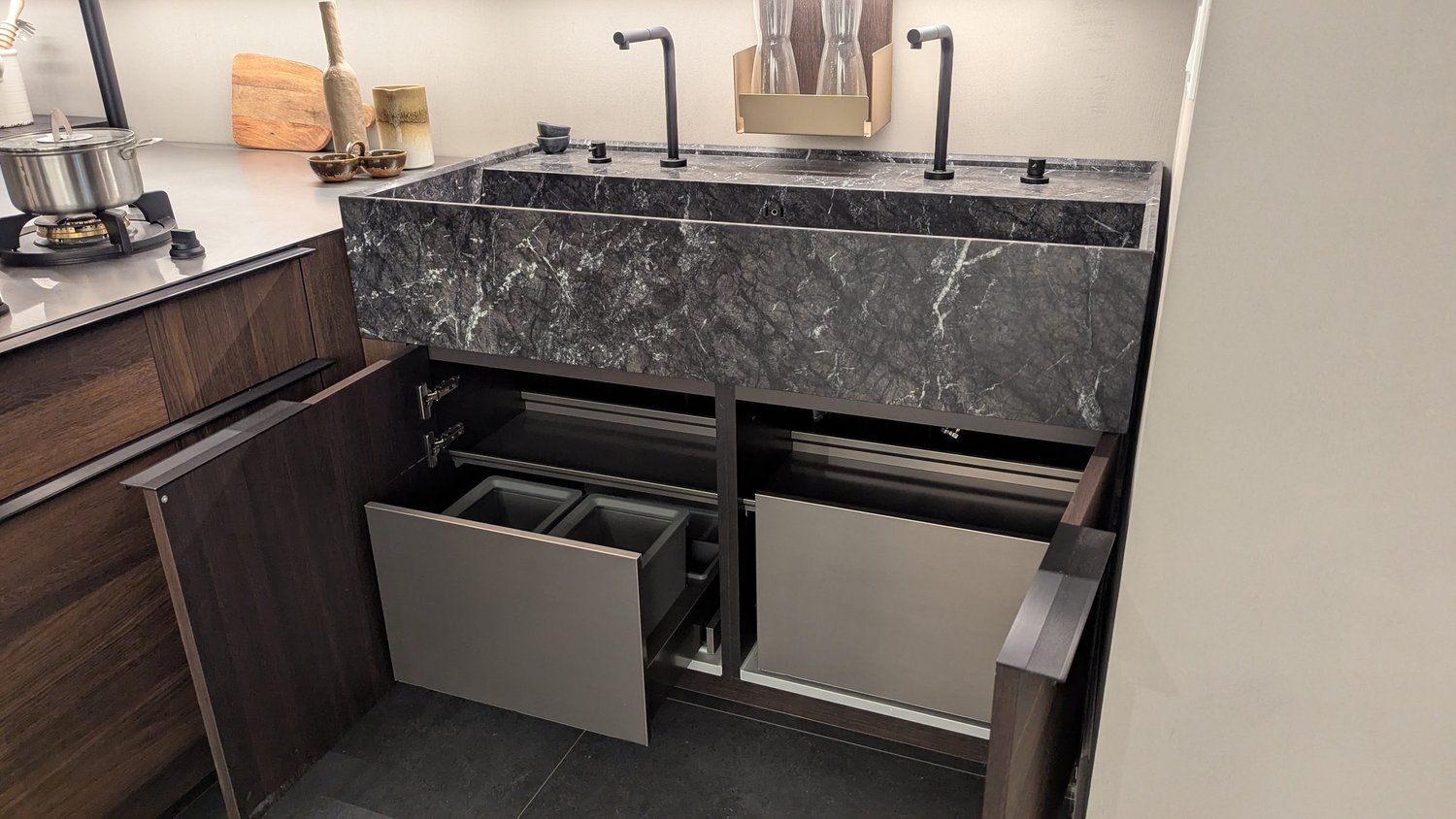 Cesar Modern Dark Wood Tone Kitchen with Black Wood Veneer Countertops and Custom Marble Sink