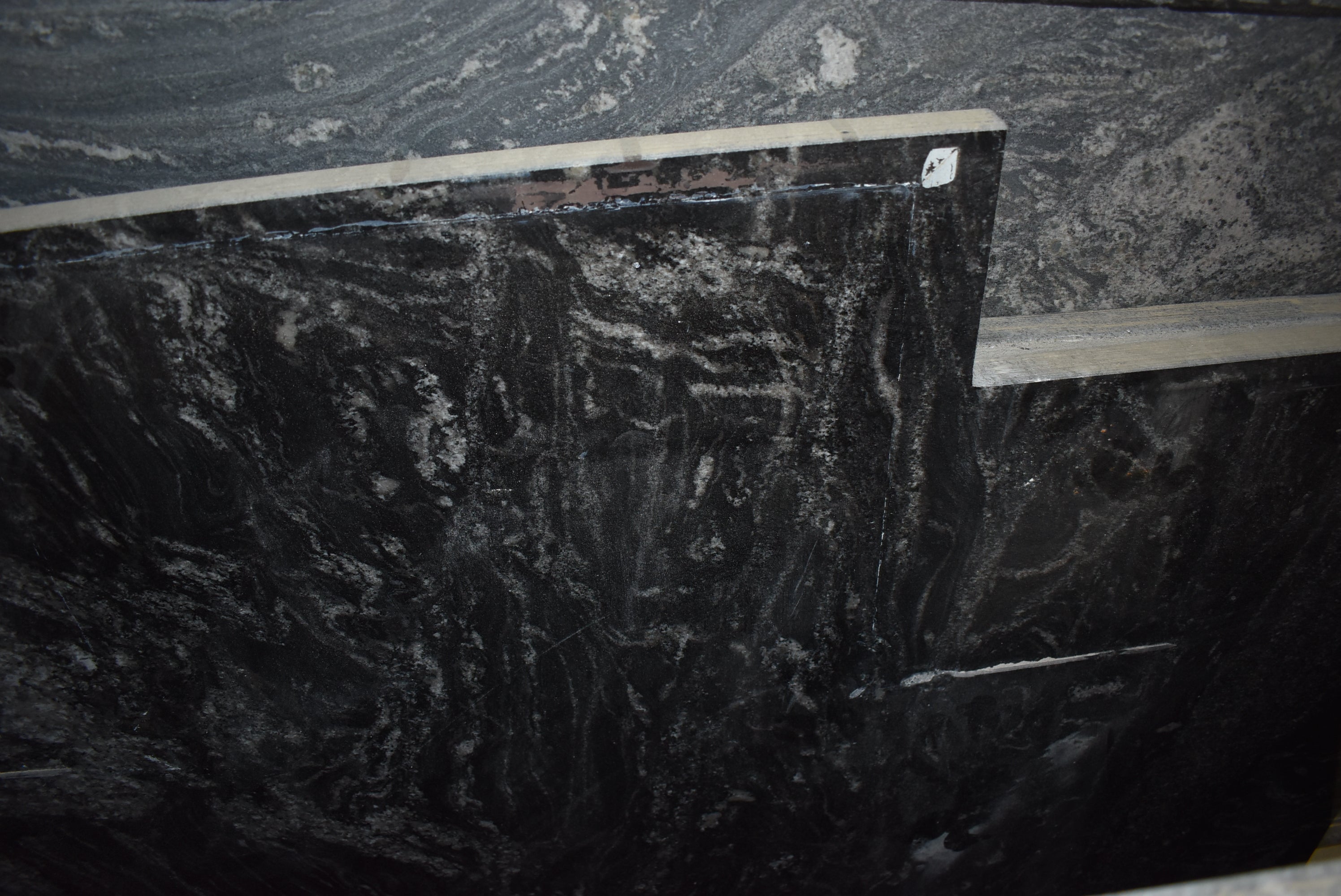 Christopher Peacock Traditional Black Kitchen with Stone Countertops & JennAir Appliances