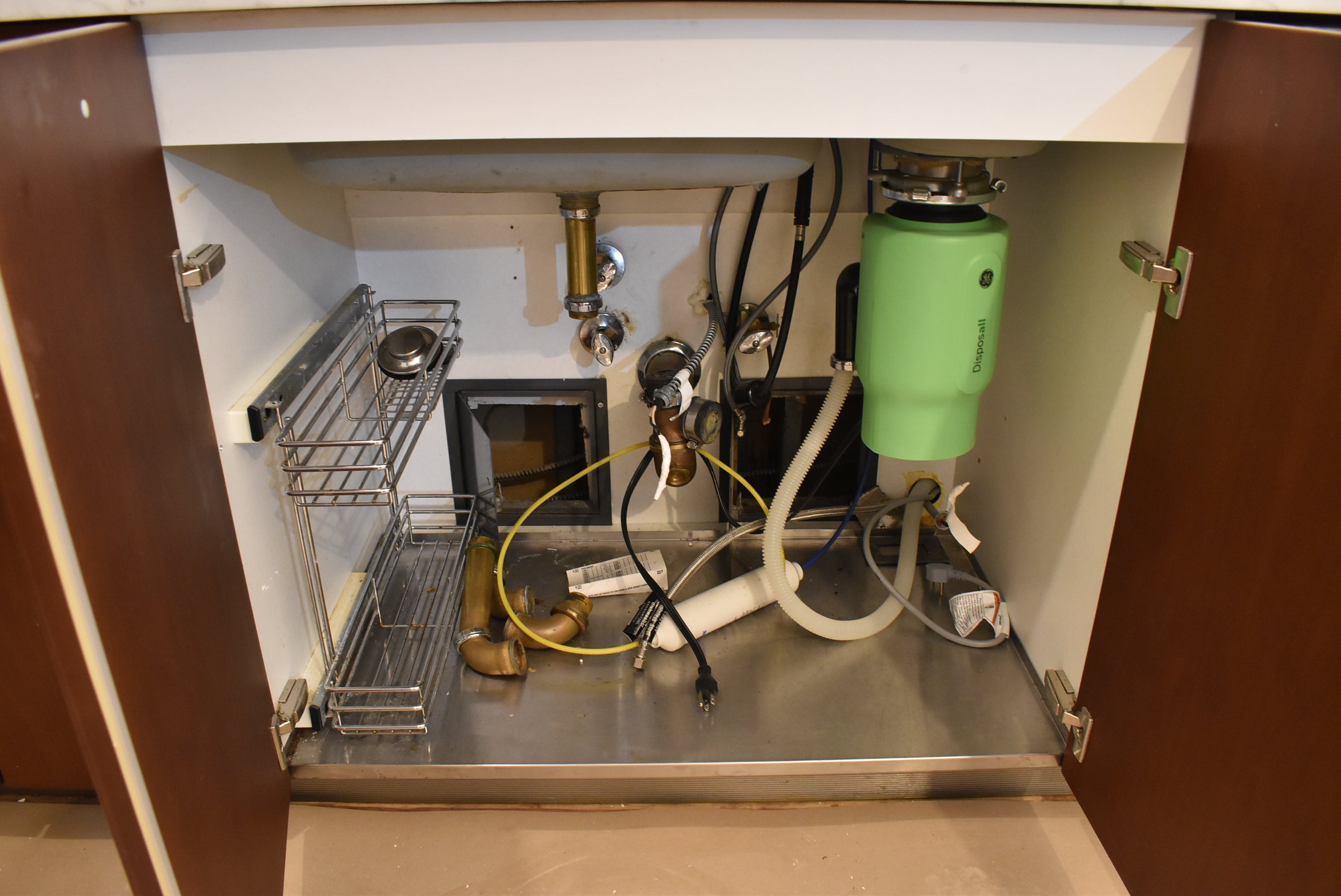 Poggenpohl Brown Toned Transitional Kitchen with Marble Countertops and Appliances