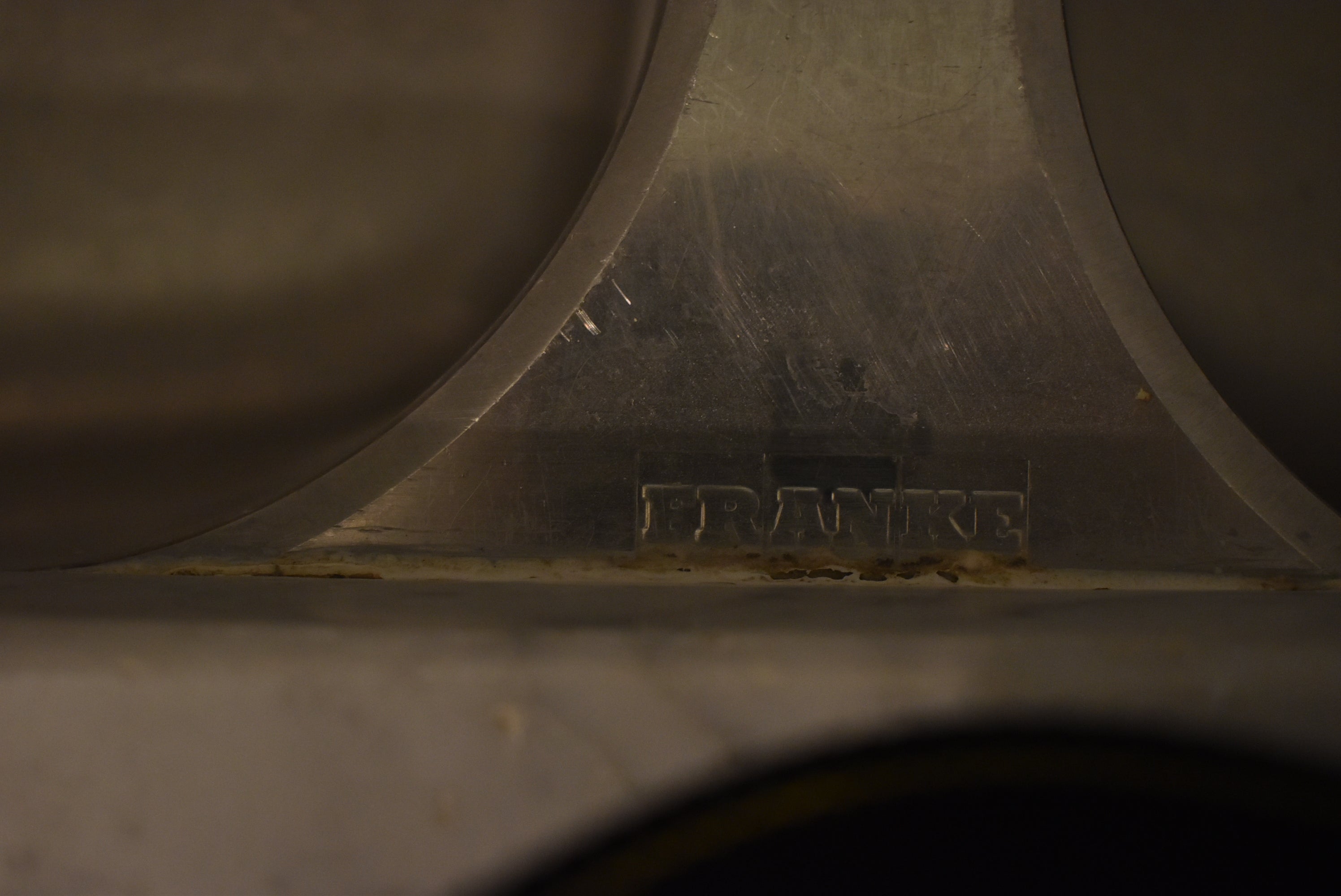 Poggenpohl Brown Toned Transitional Kitchen with Marble Countertops and Appliances