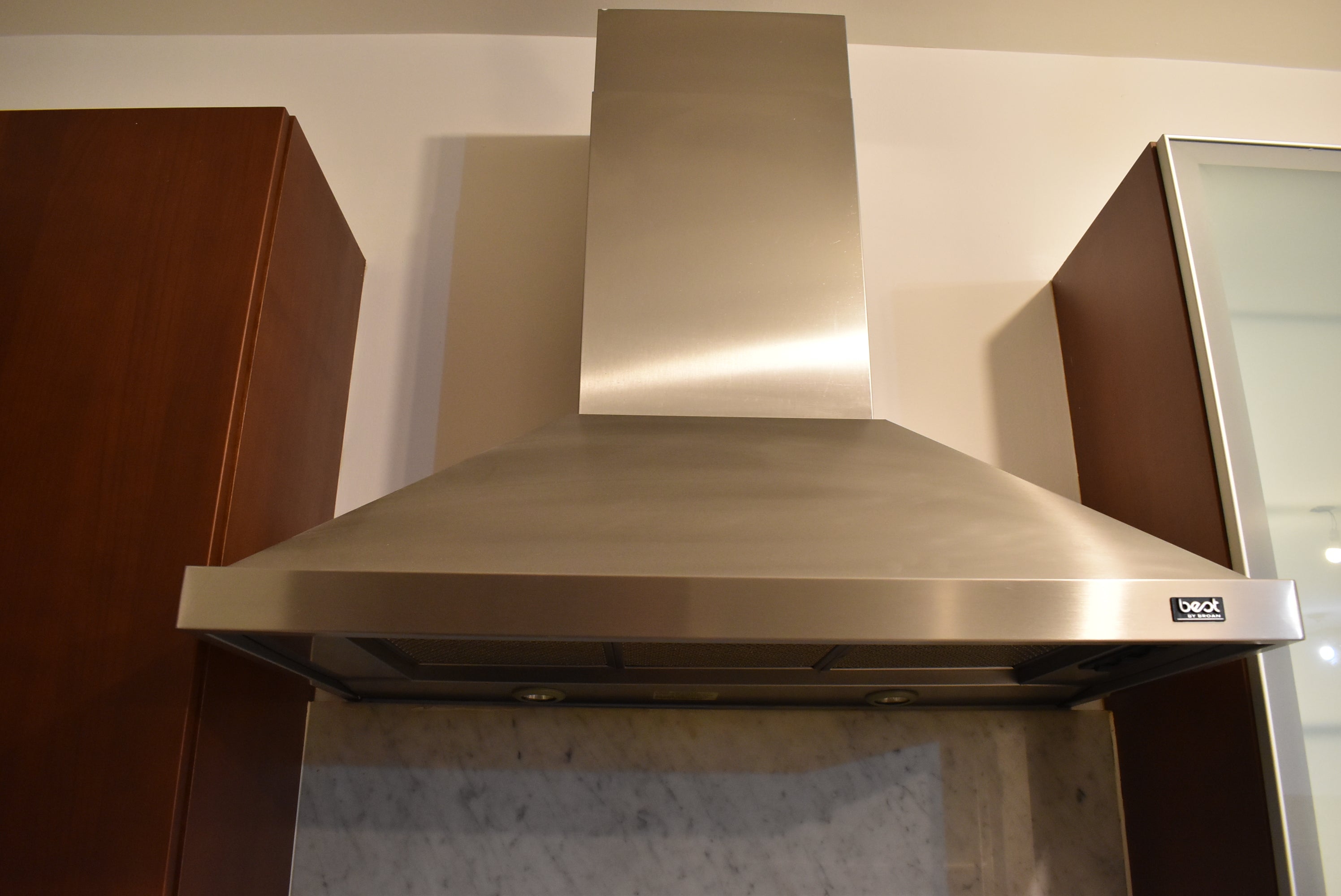 Poggenpohl Brown Toned Transitional Kitchen with Marble Countertops and Appliances