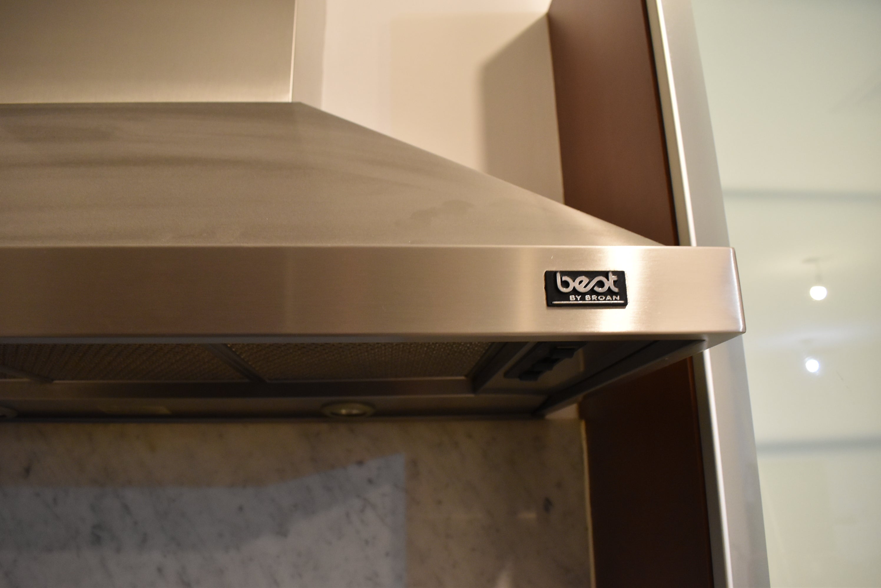 Poggenpohl Brown Toned Transitional Kitchen with Marble Countertops and Appliances