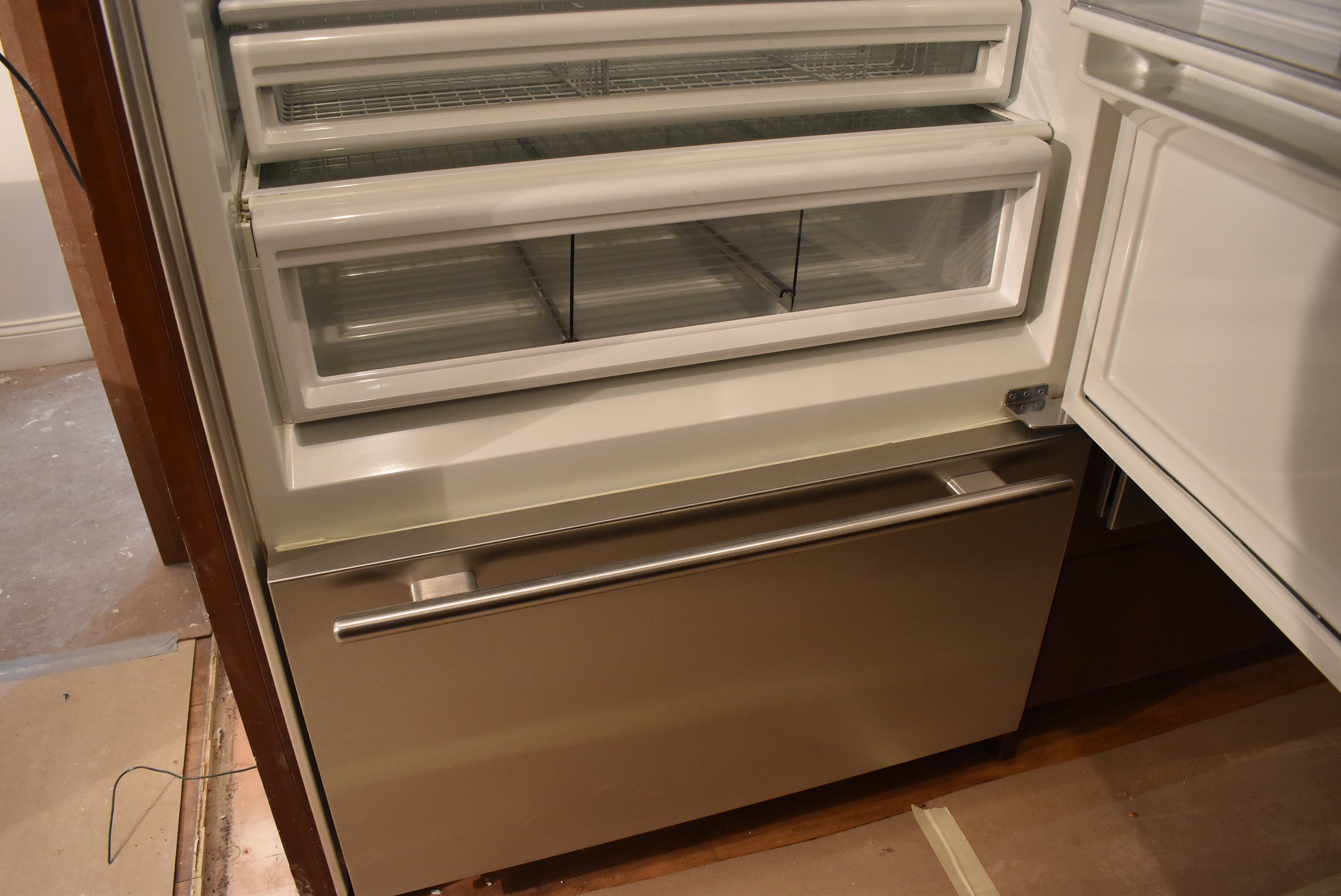 Poggenpohl Brown Toned Transitional Kitchen with Marble Countertops and Appliances