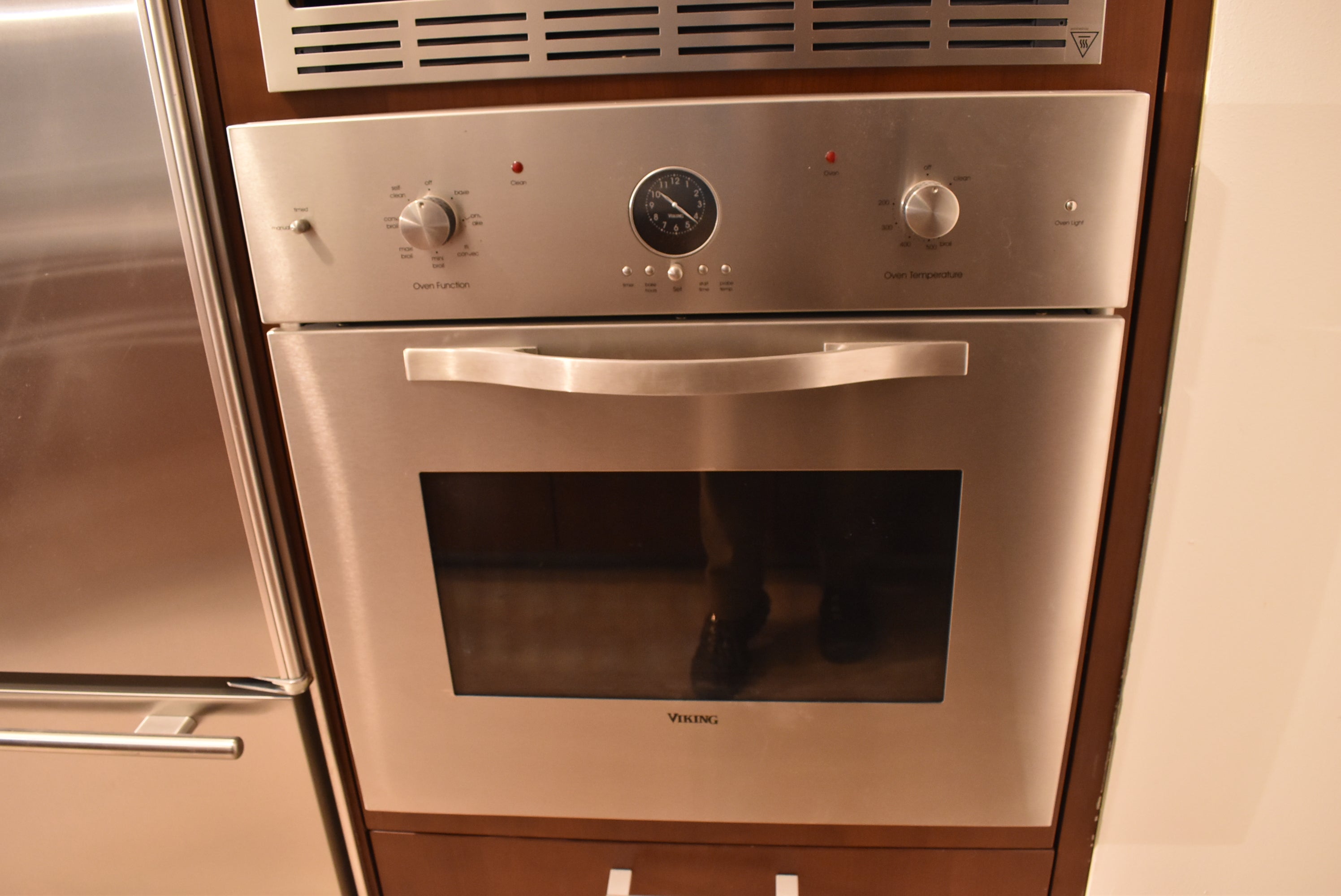 Poggenpohl Brown Toned Transitional Kitchen with Marble Countertops and Appliances