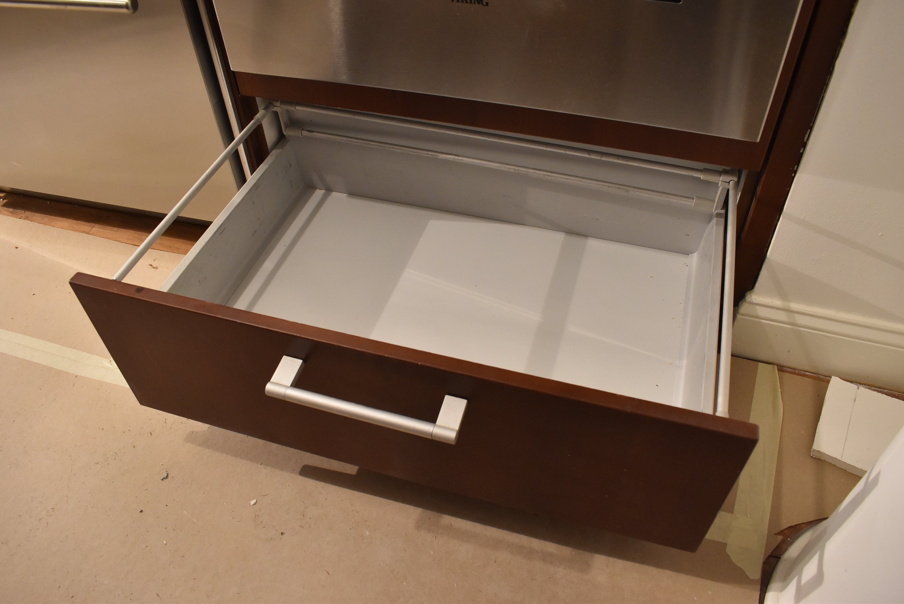 Poggenpohl Brown Toned Transitional Kitchen with Marble Countertops and Appliances