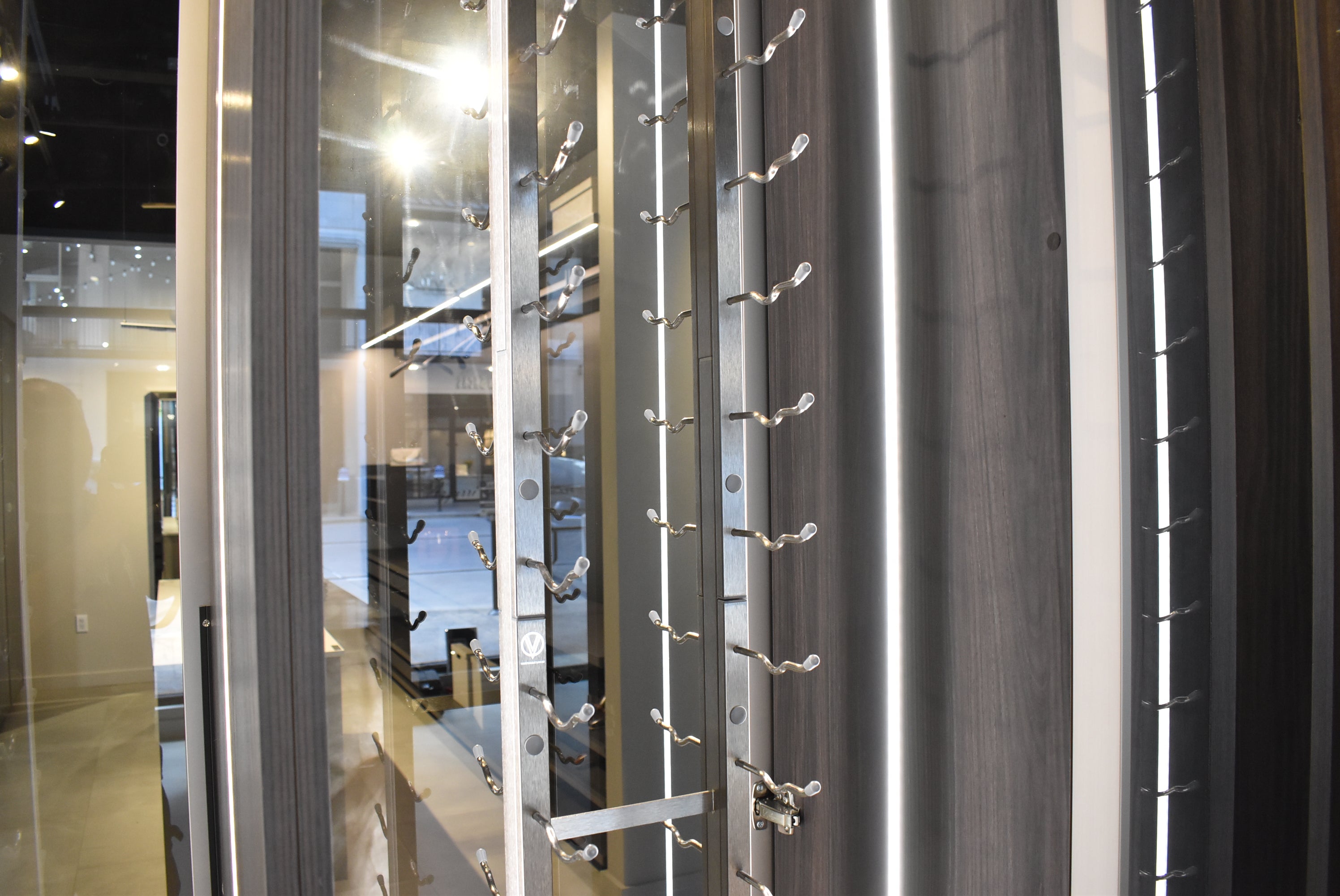 Azzurri Casa Modern Wood Paneled Wet Wine Bar with Wine Wall and Onyx Countertops