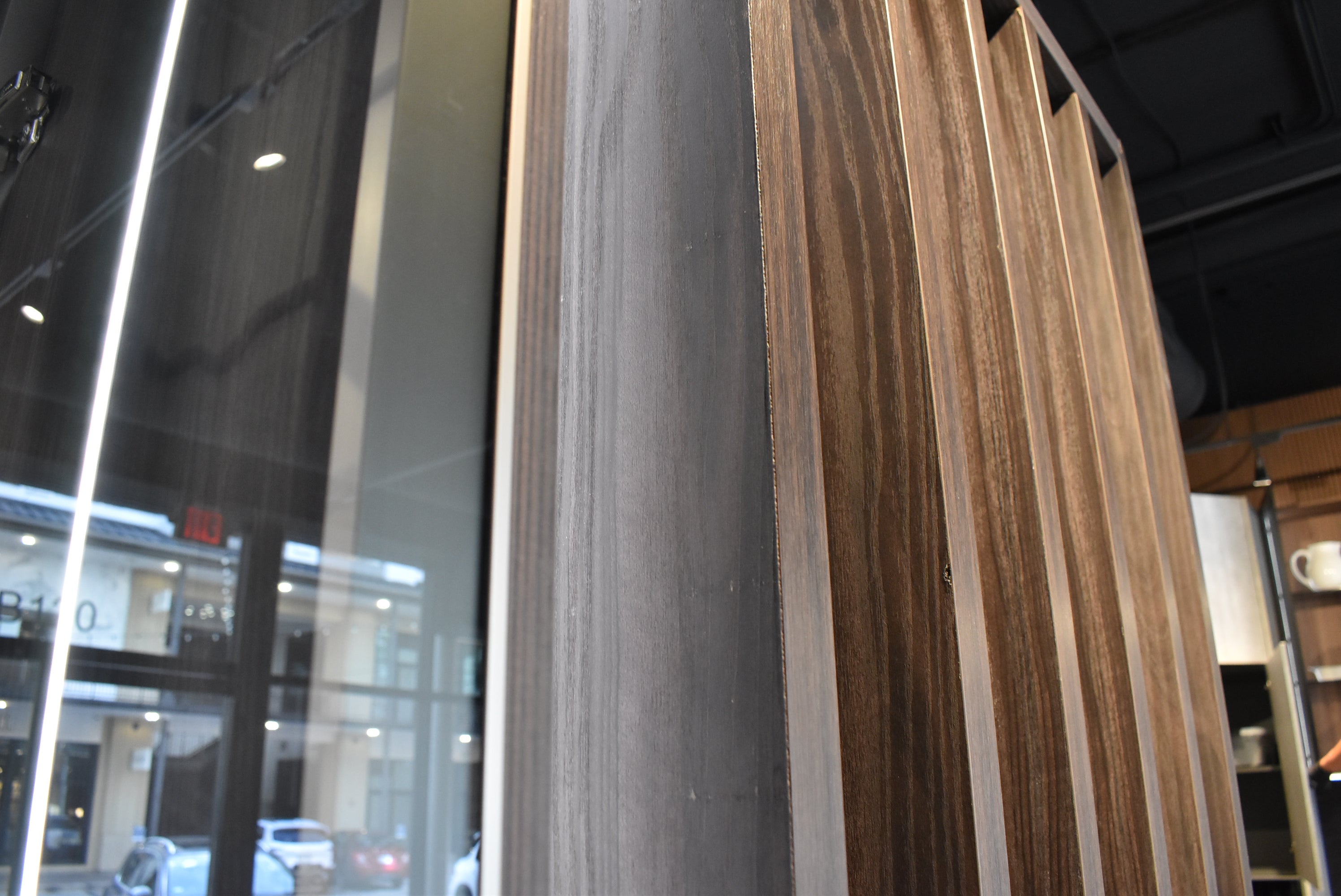 Azzurri Casa Modern Wood Paneled Wet Wine Bar with Wine Wall and Onyx Countertops