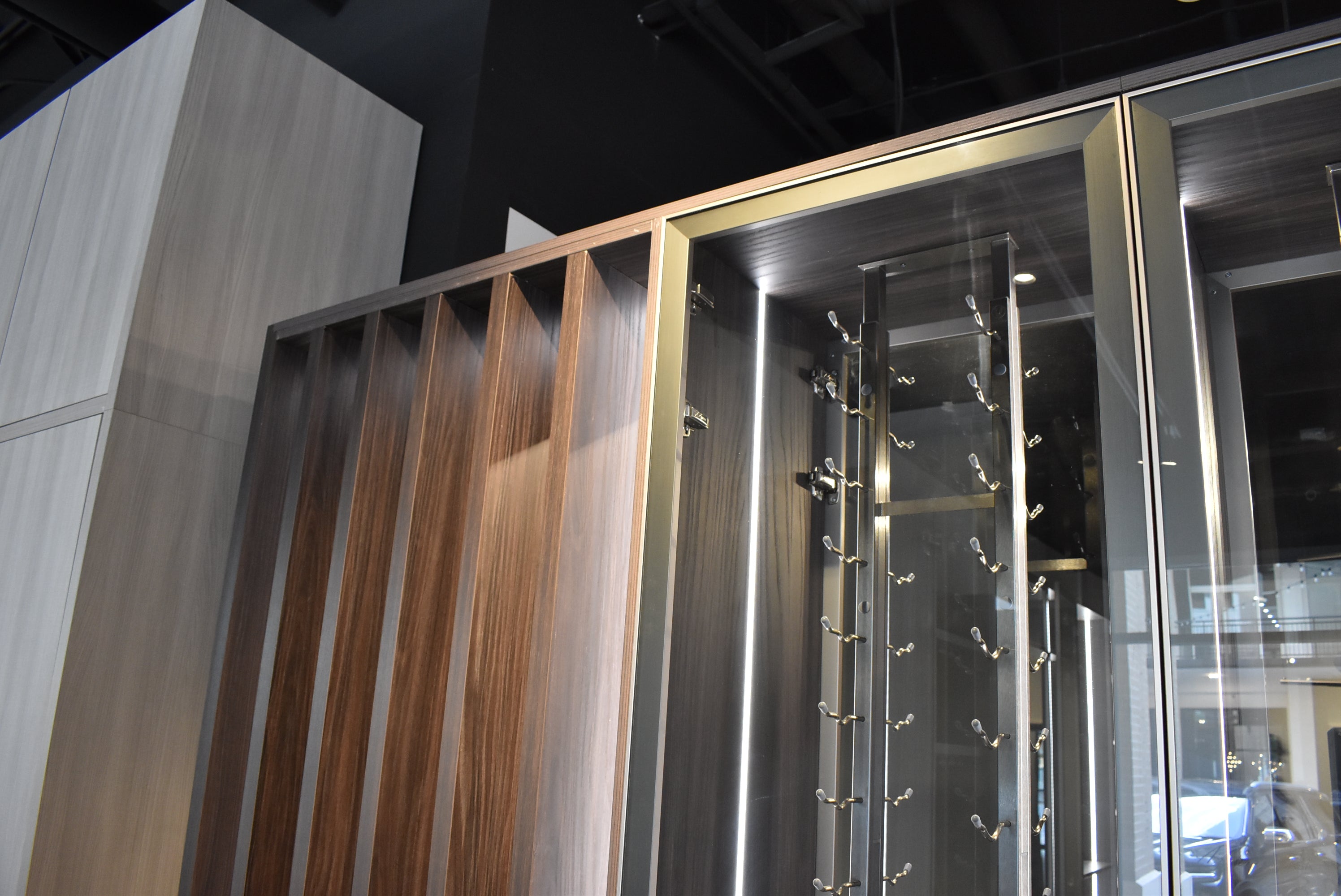 Azzurri Casa Modern Wood Paneled Wet Wine Bar with Wine Wall and Onyx Countertops