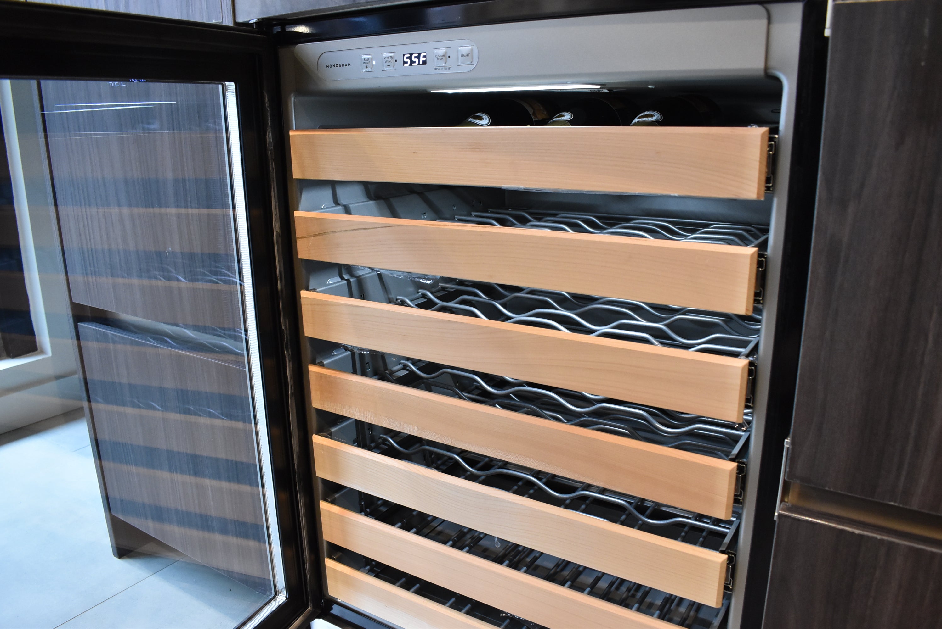 Azzurri Casa Modern Wood Paneled Wet Wine Bar with Wine Wall and Onyx Countertops