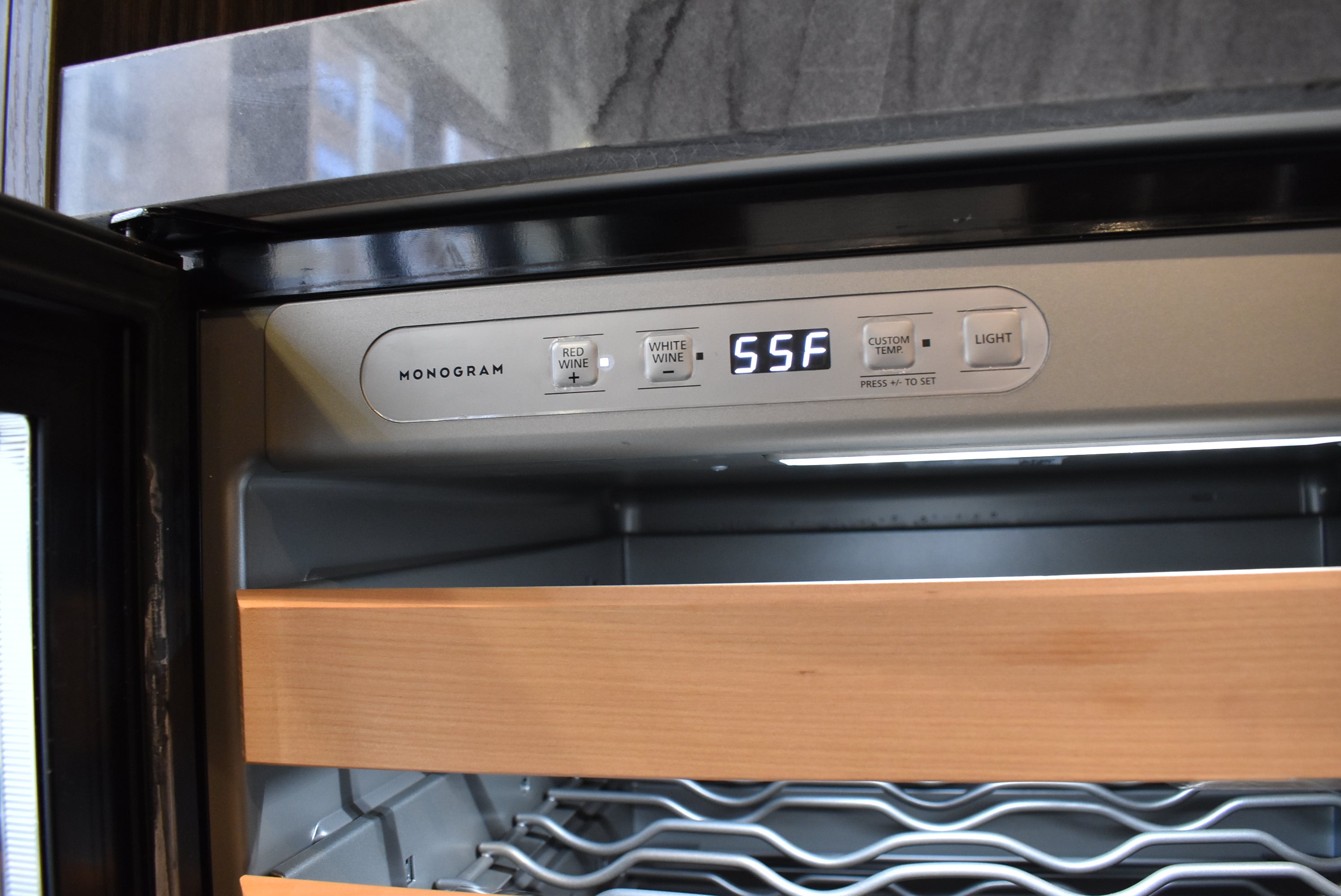 Azzurri Casa Modern Wood Paneled Wet Wine Bar with Wine Wall and Onyx Countertops