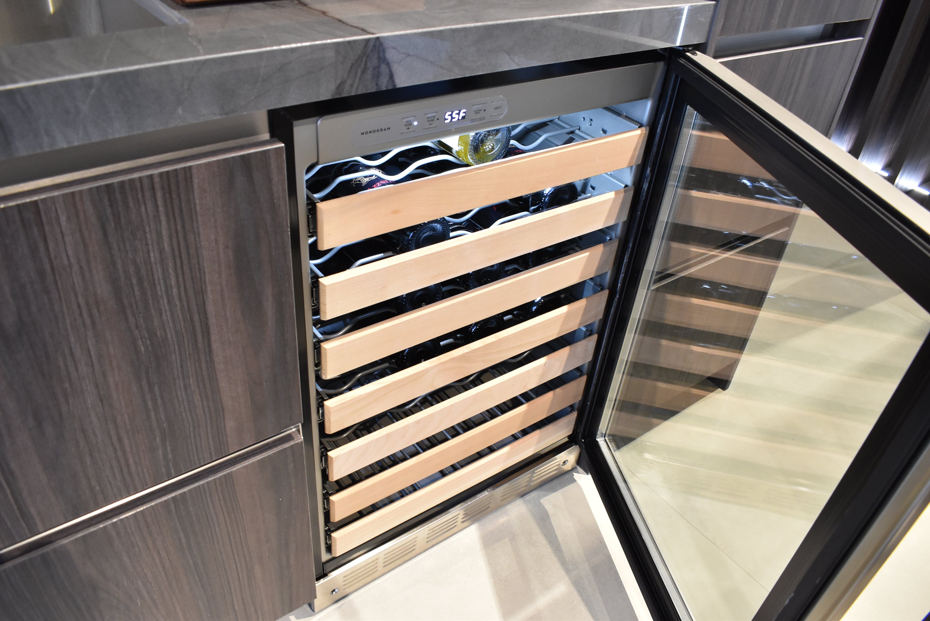 Azzurri Casa Modern Wood Paneled Wet Wine Bar with Wine Wall and Onyx Countertops