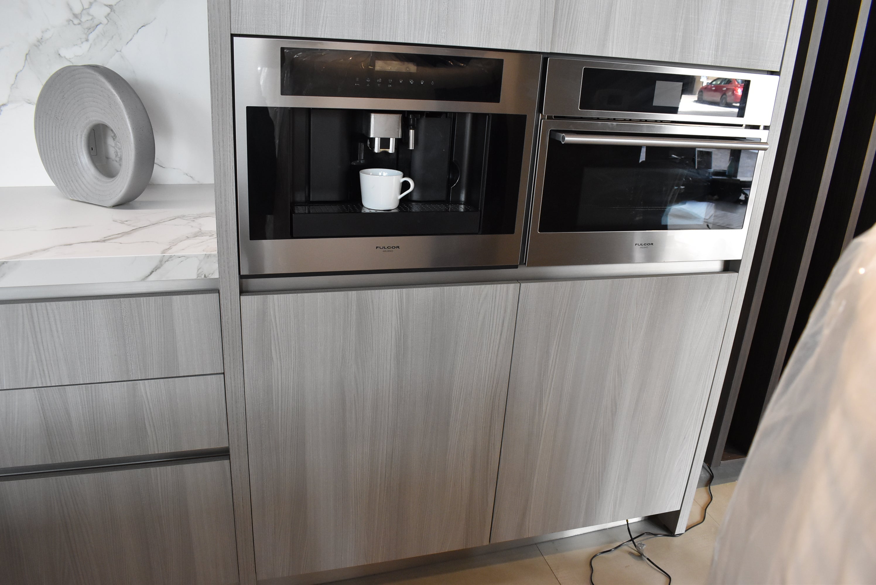 Azzurri Casa Light Grey Italian Style Modern Kitchen with Dekton Countertops and Fulgor Milano Appliances