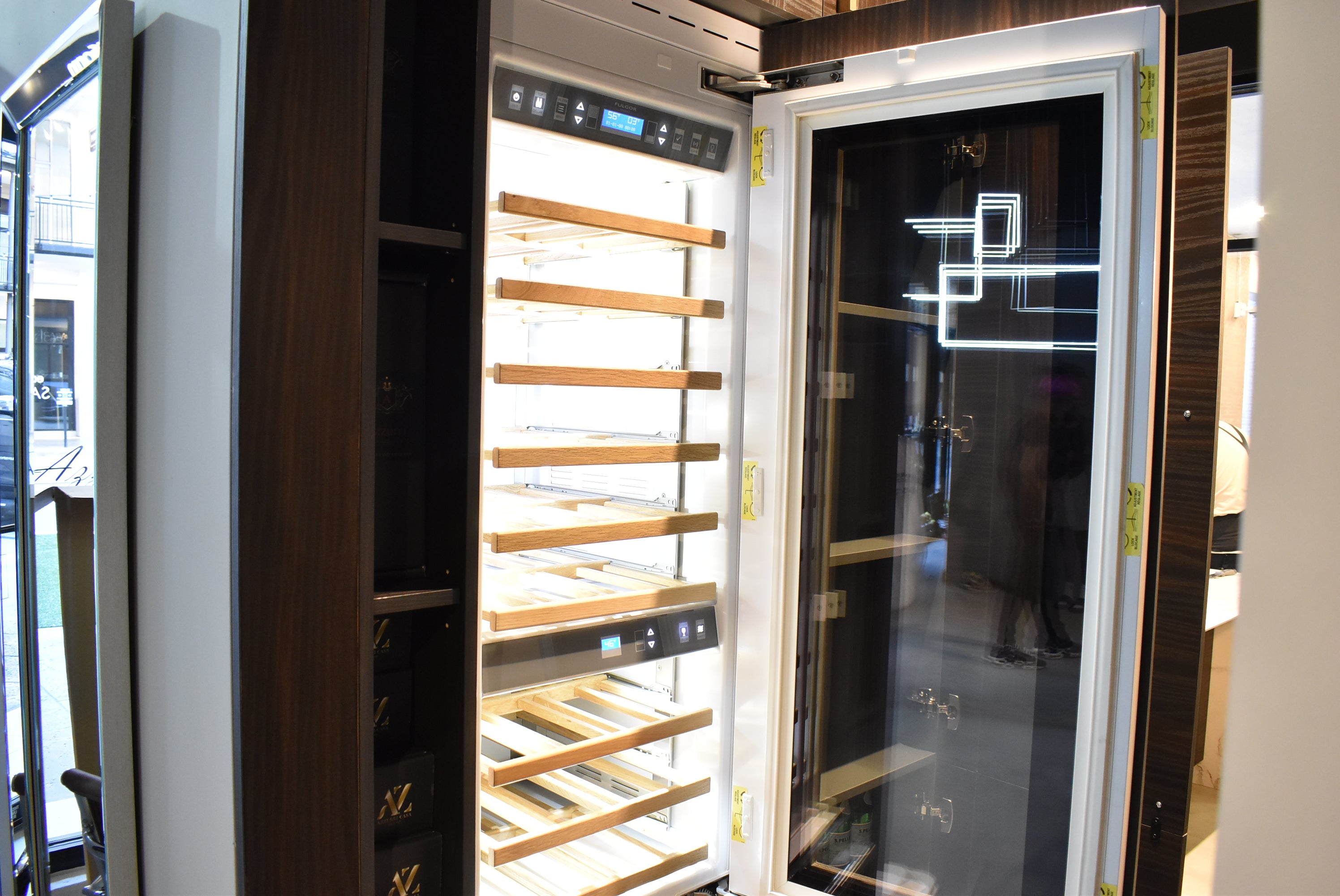 Azzurri Casa Transitional Kitchen with Double Waterfall Island, Dekton Countertops & Monogram Appliances