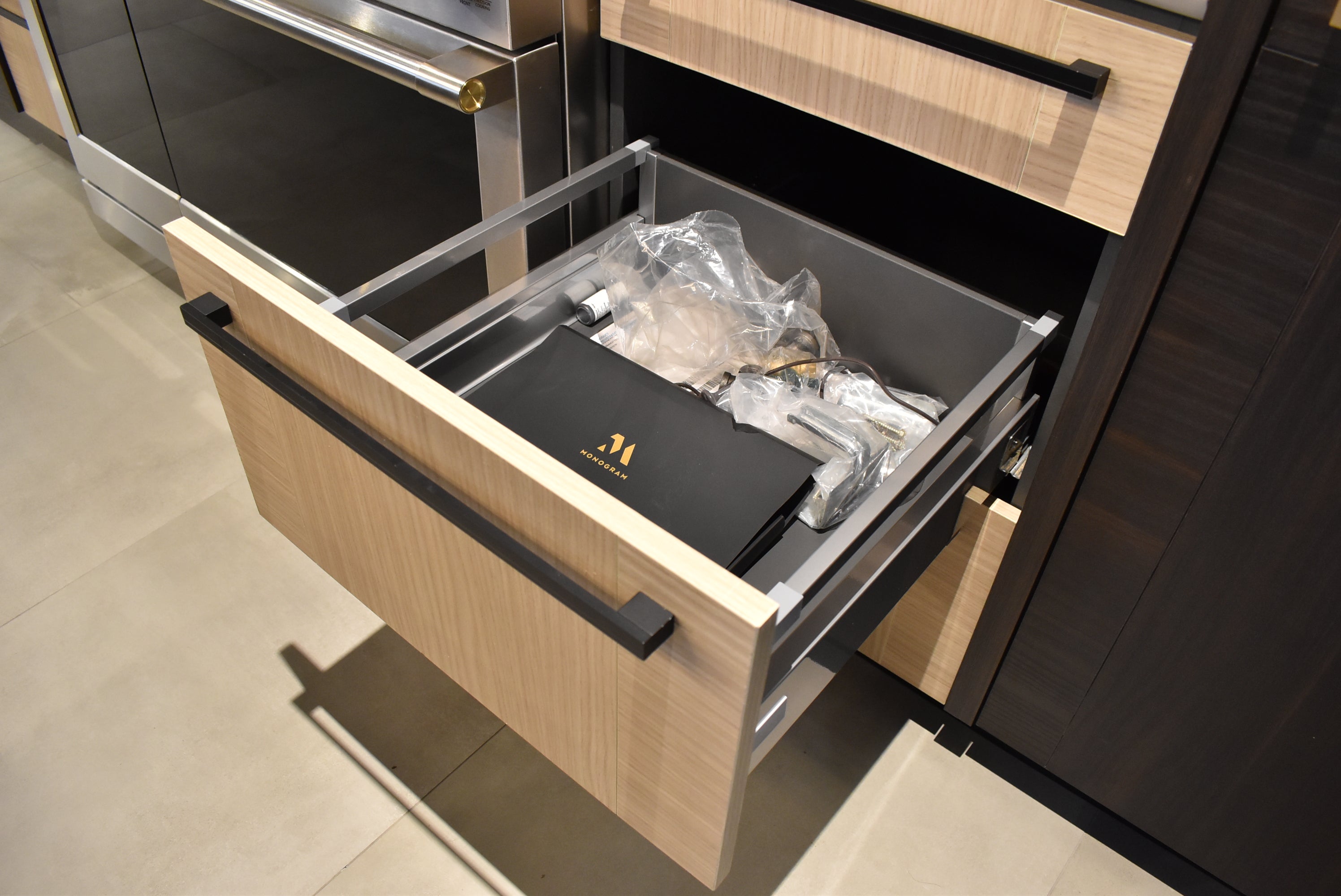 Azzurri Casa Transitional Kitchen with Double Waterfall Island, Dekton Countertops & Monogram Appliances