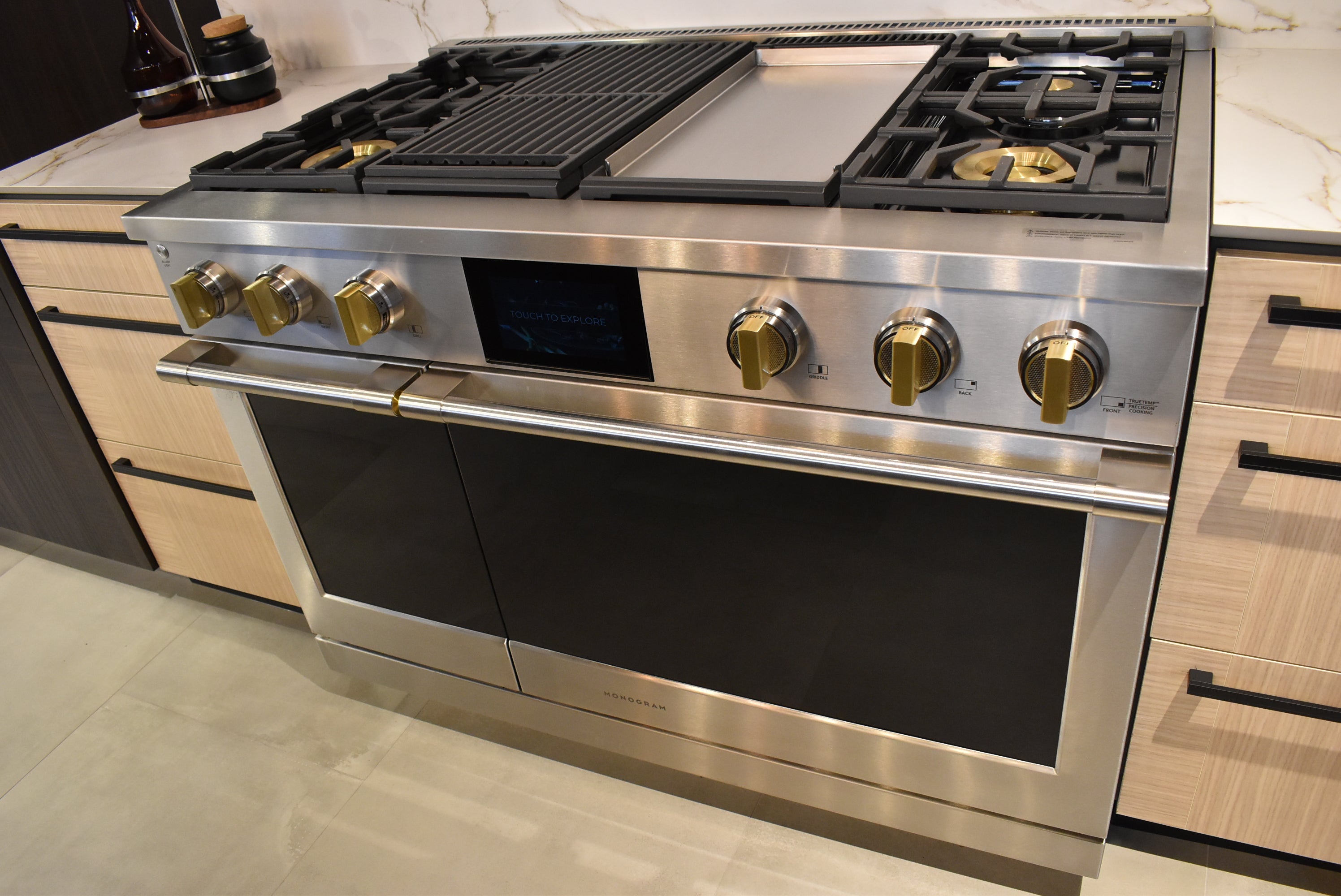 Azzurri Casa Transitional Kitchen with Double Waterfall Island, Dekton Countertops & Monogram Appliances