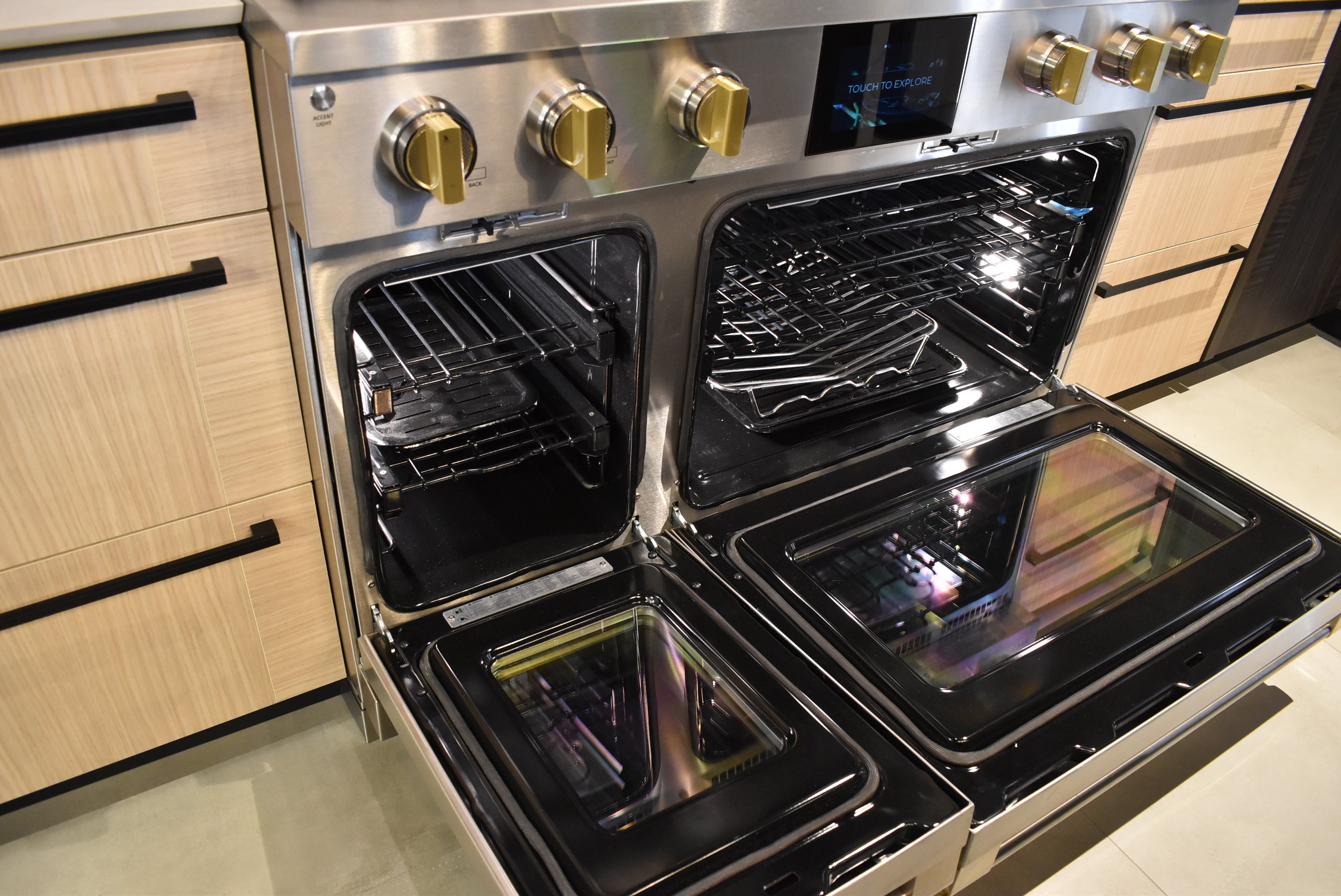 Azzurri Casa Transitional Kitchen with Double Waterfall Island, Dekton Countertops & Monogram Appliances