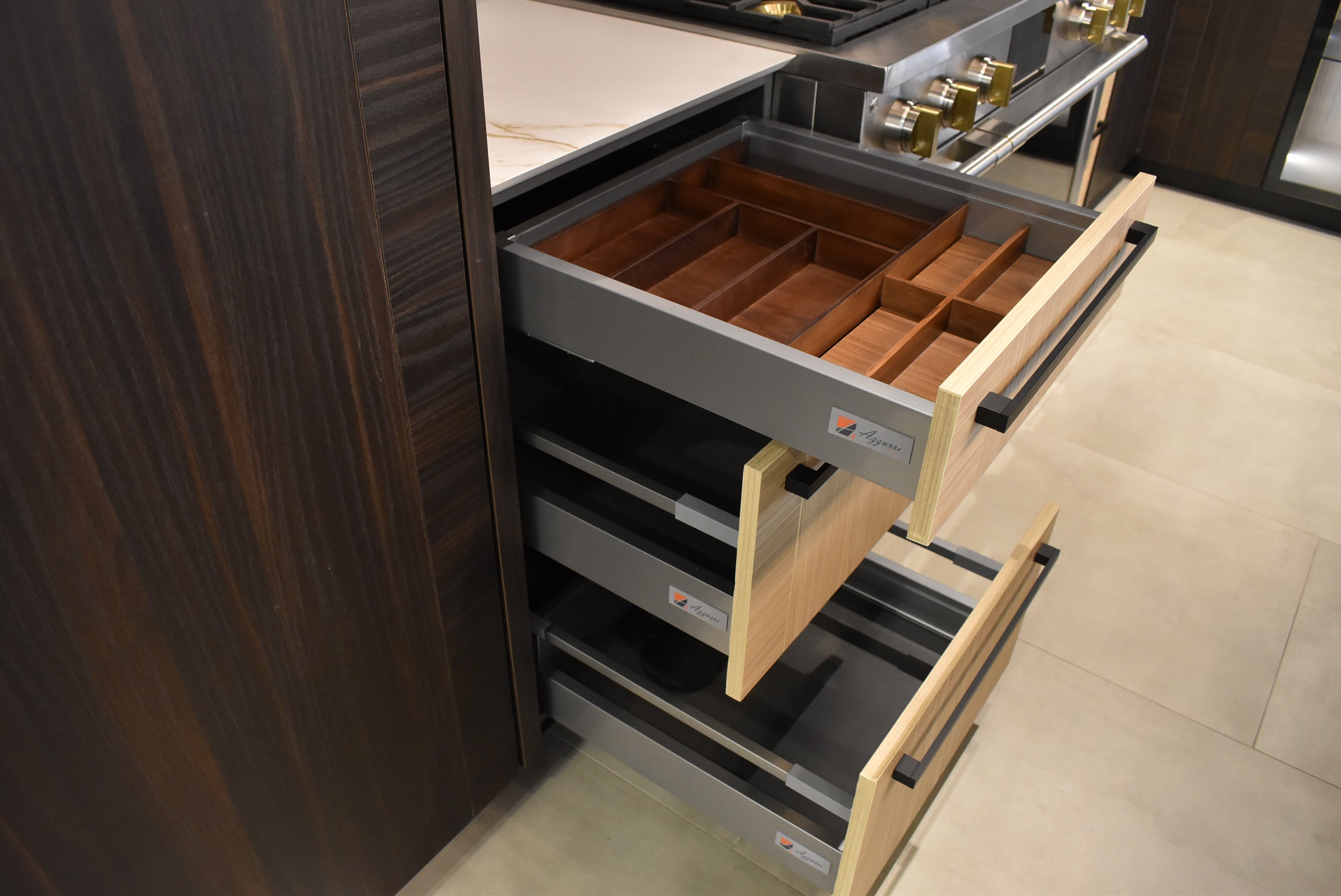 Azzurri Casa Transitional Kitchen with Double Waterfall Island, Dekton Countertops & Monogram Appliances