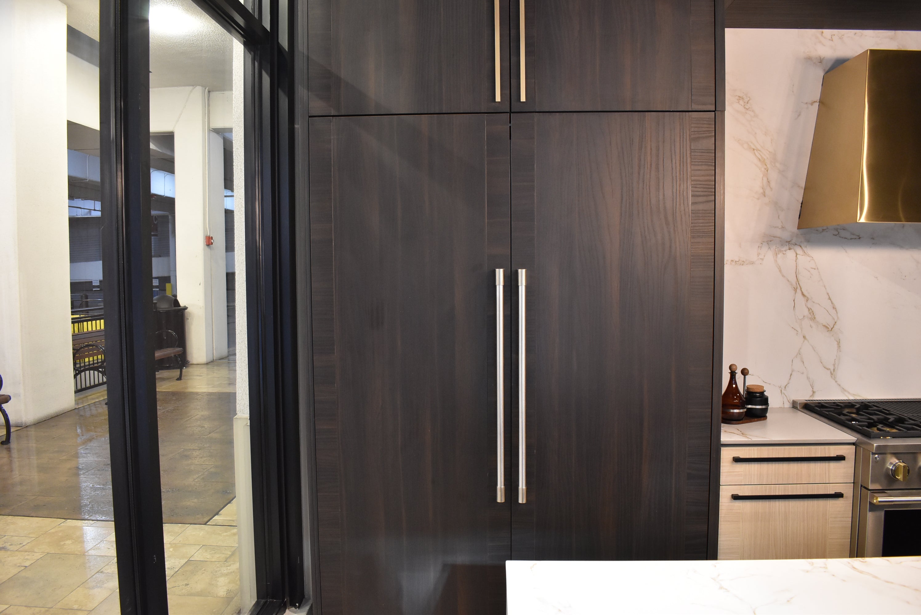 Azzurri Casa Transitional Kitchen with Double Waterfall Island, Dekton Countertops & Monogram Appliances