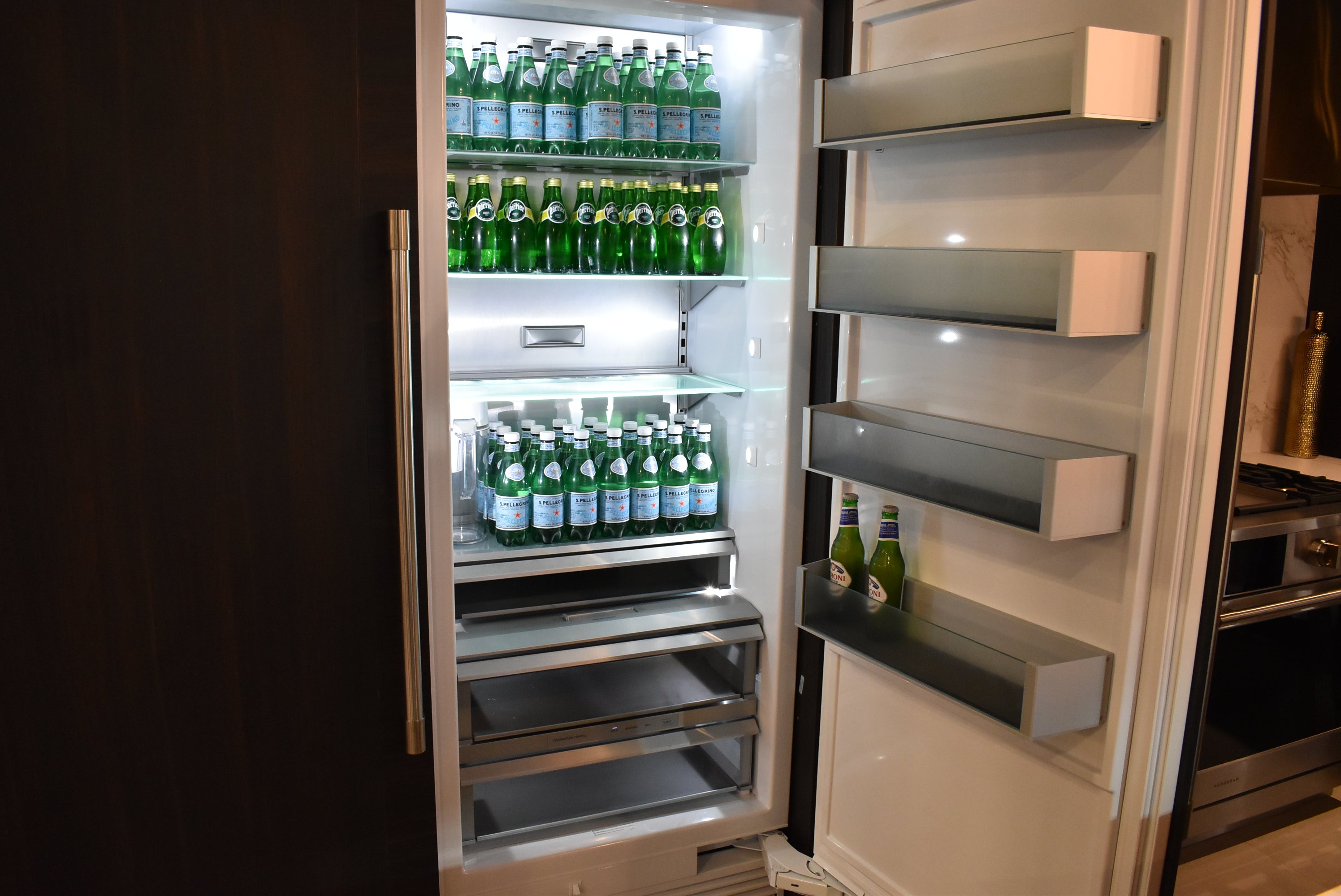 Azzurri Casa Transitional Kitchen with Double Waterfall Island, Dekton Countertops & Monogram Appliances