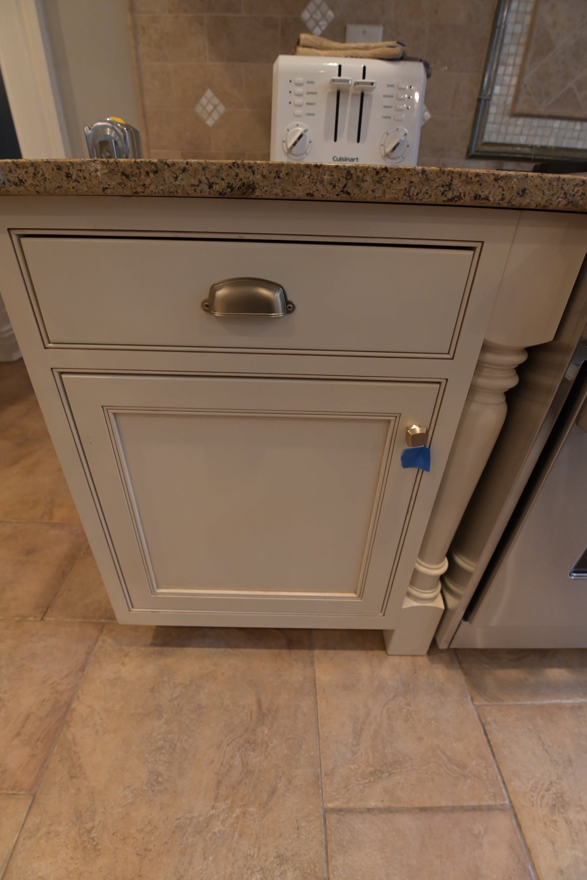 Omega Transitional Linen White Kitchen with Black Island