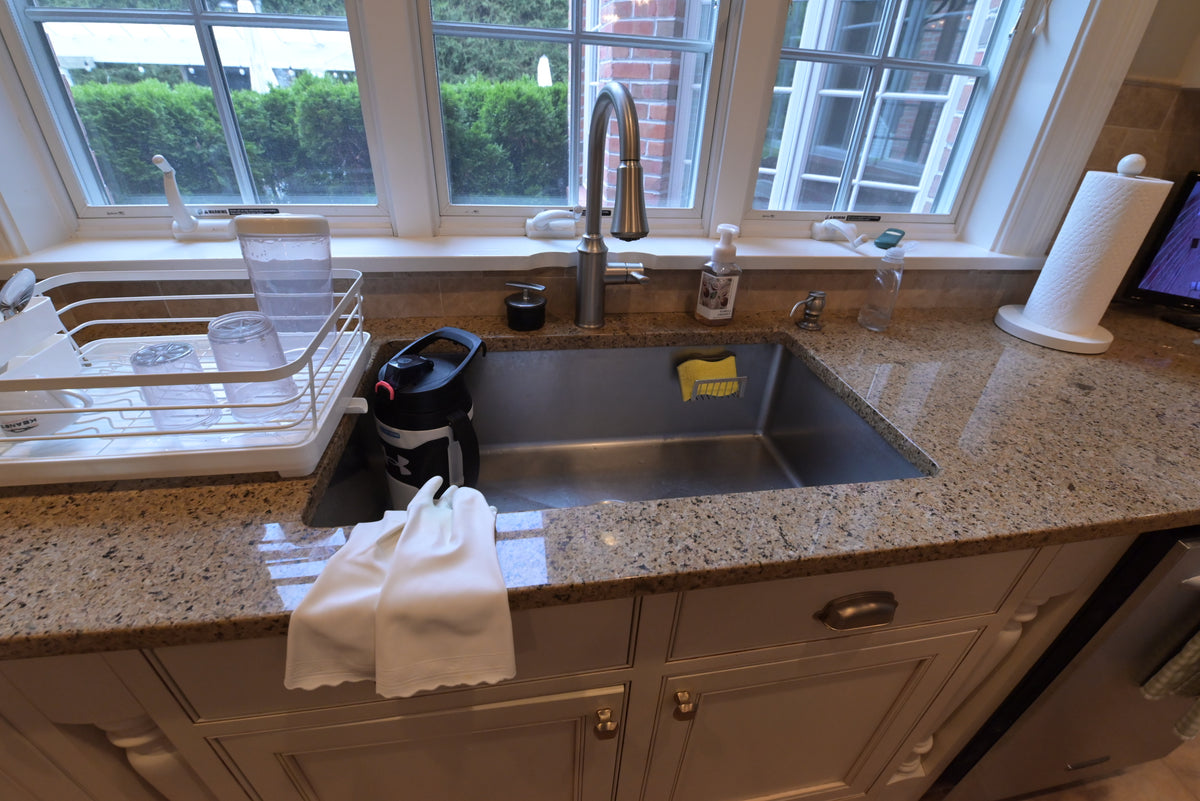 Omega Transitional Linen White Kitchen with Black Island