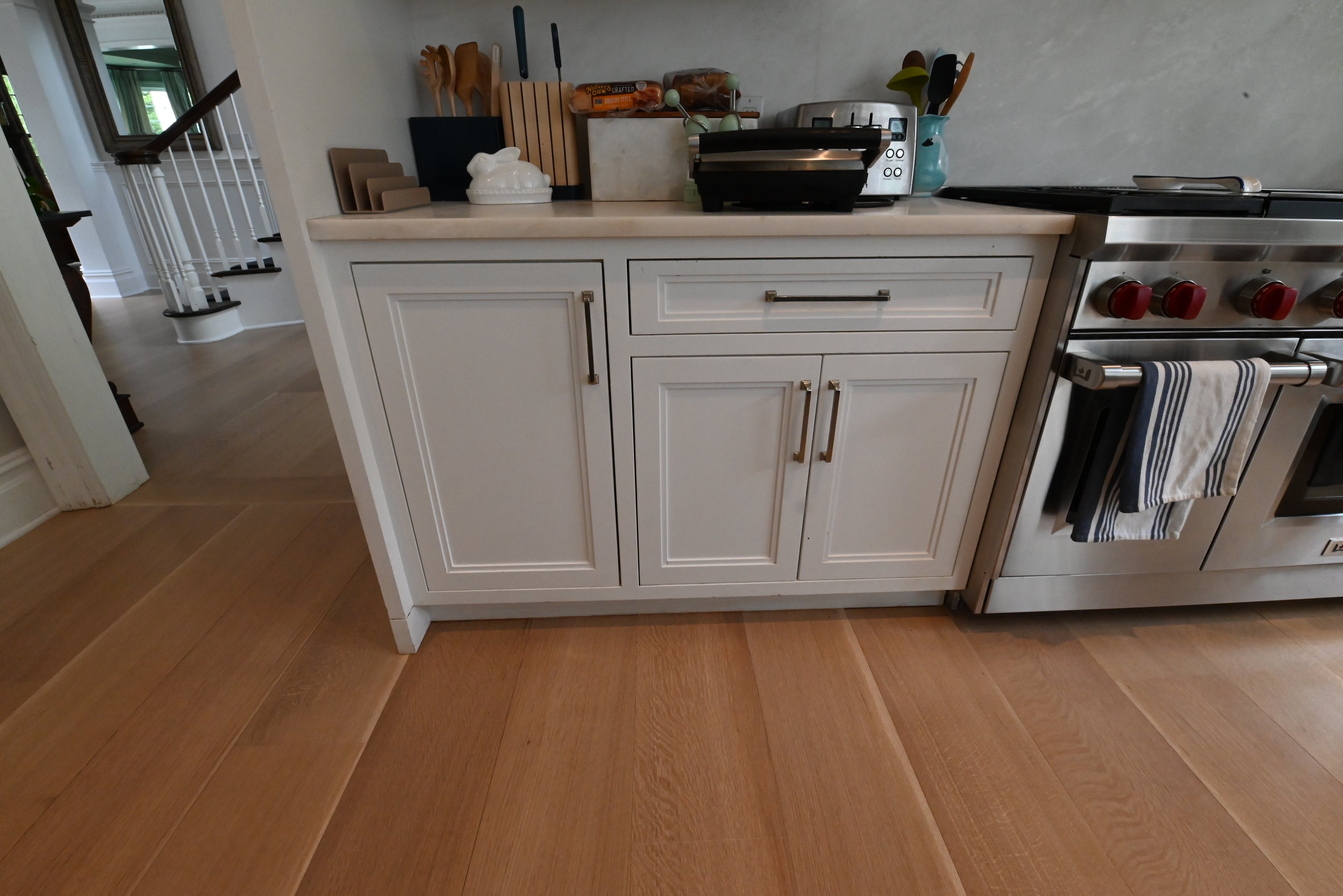 "The Abercorn" Transitional White Kitchen with Island & 48" Wolf Range