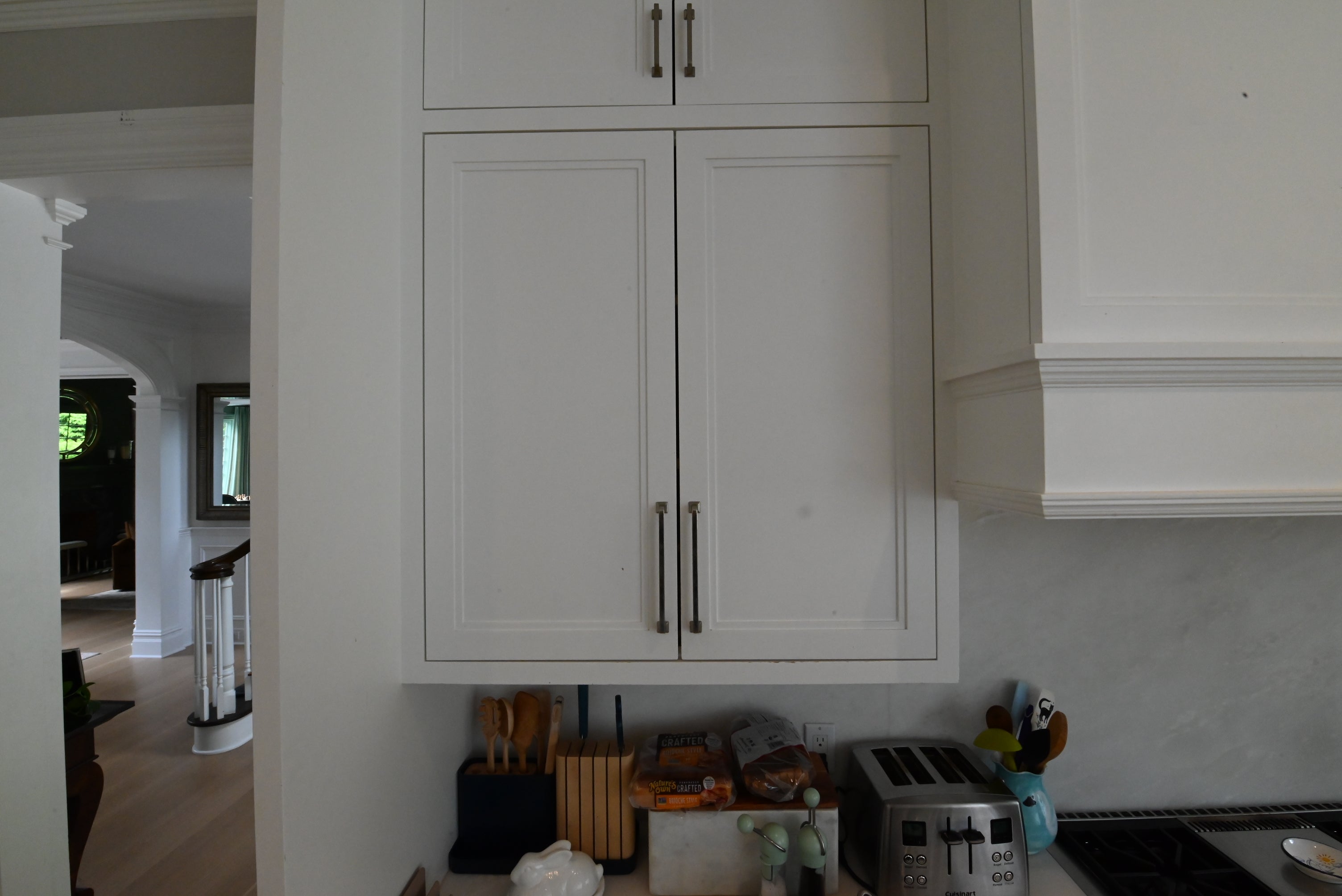 "The Abercorn" Transitional White Kitchen with Island & 48" Wolf Range