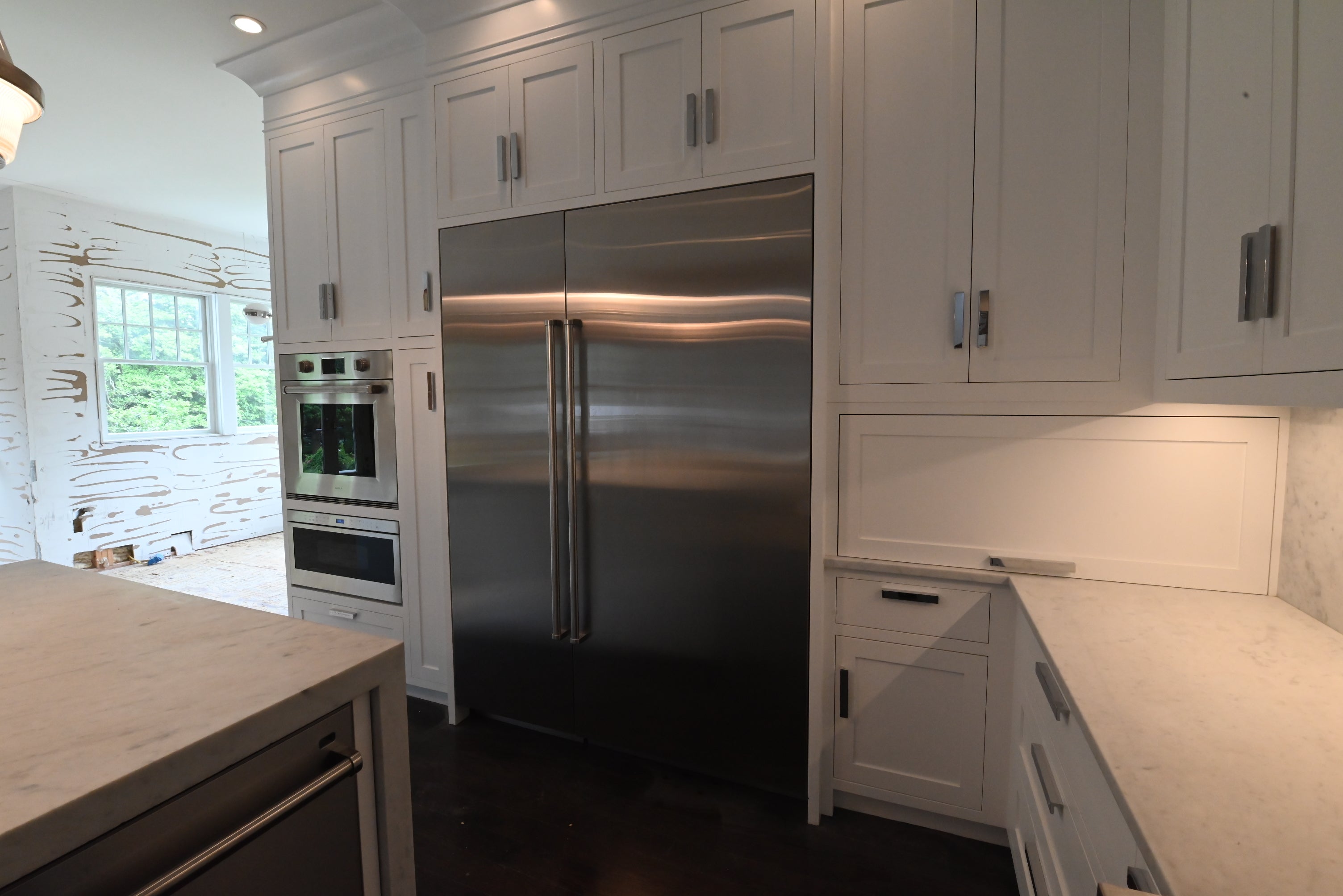 “The Pembroke” Transitional White Kitchen with Island, Wolf & Sub-Zero Appliances
