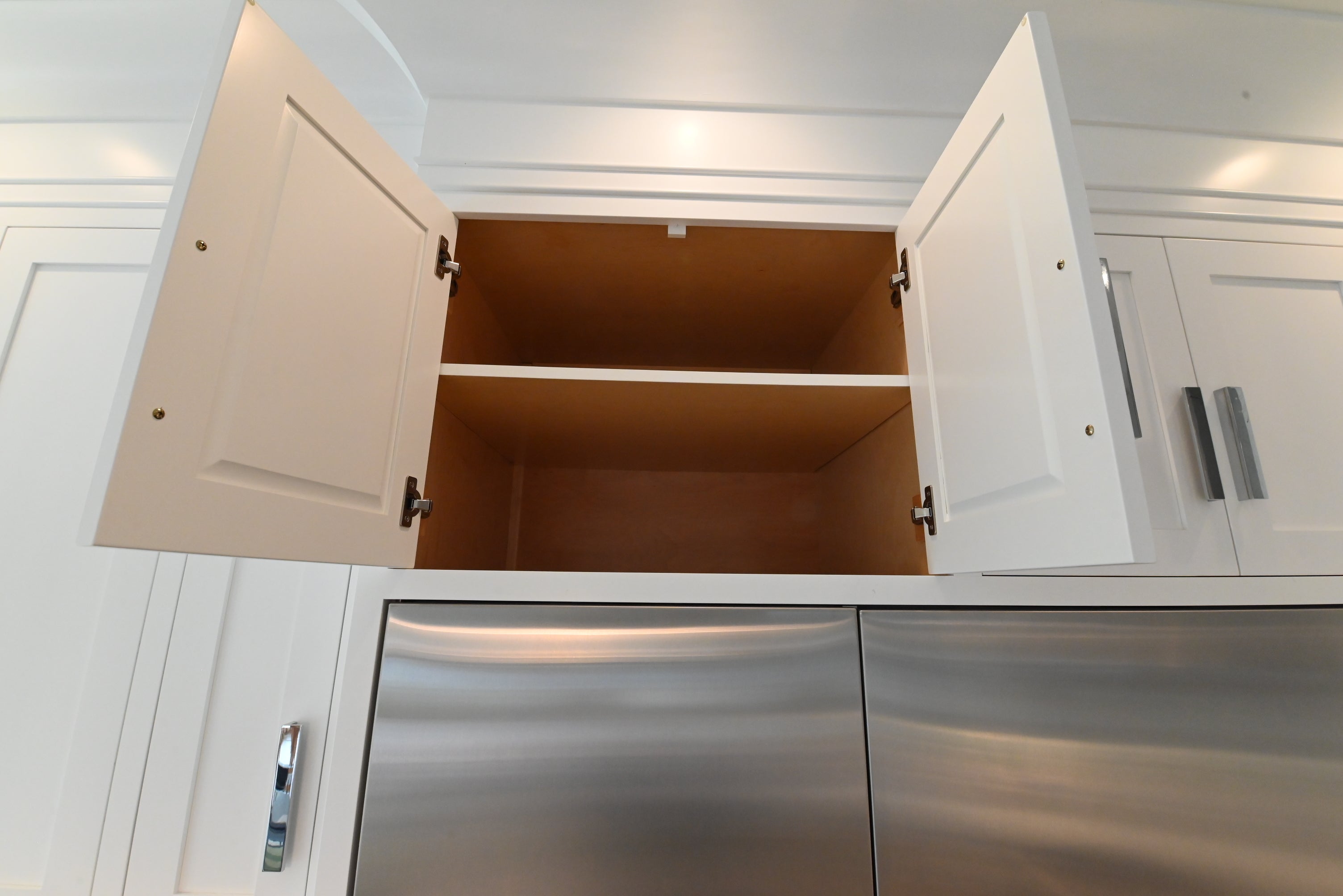 “The Pembroke” Transitional White Kitchen with Island, Wolf & Sub-Zero Appliances