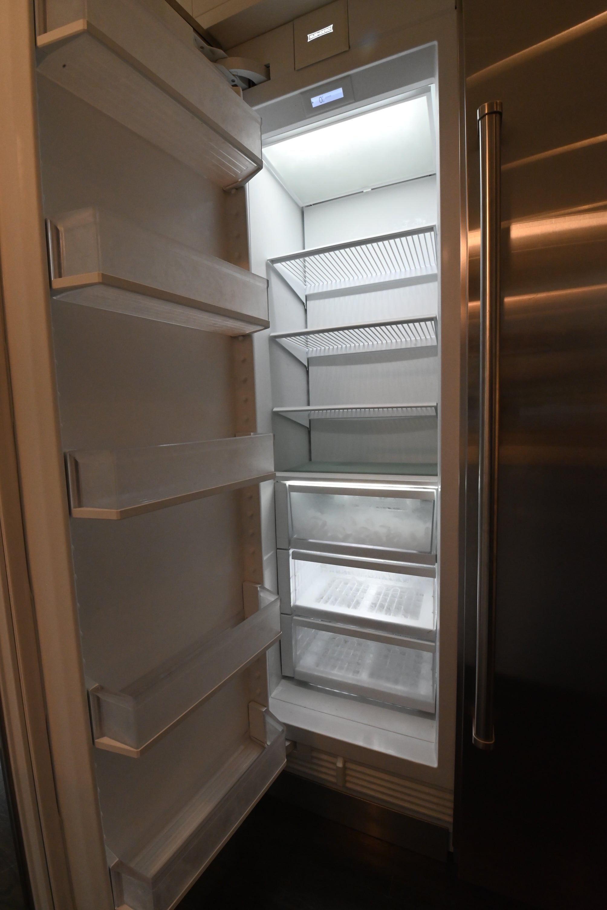 “The Pembroke” Transitional White Kitchen with Island, Wolf & Sub-Zero Appliances