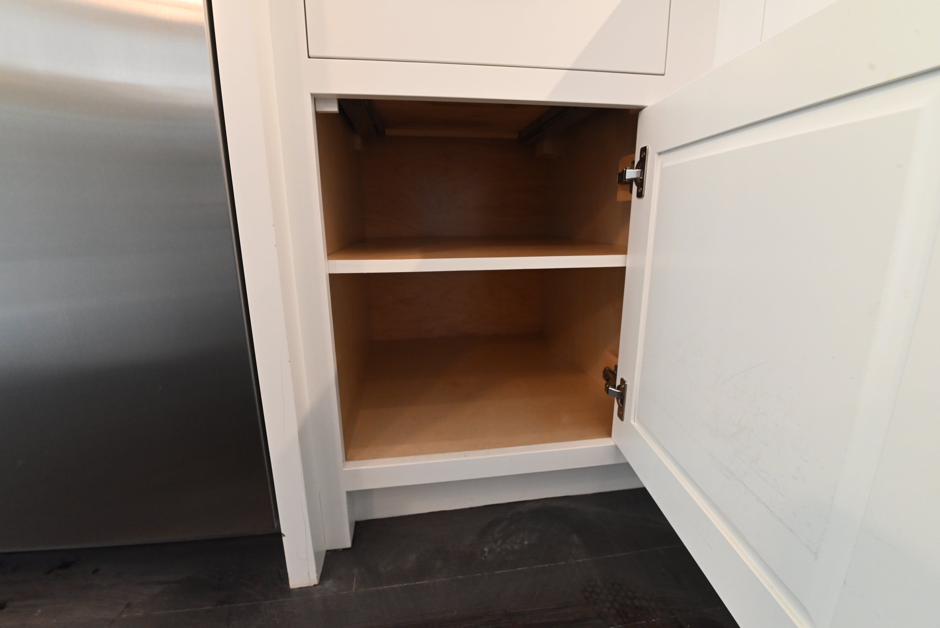 “The Pembroke” Transitional White Kitchen with Island, Wolf & Sub-Zero Appliances