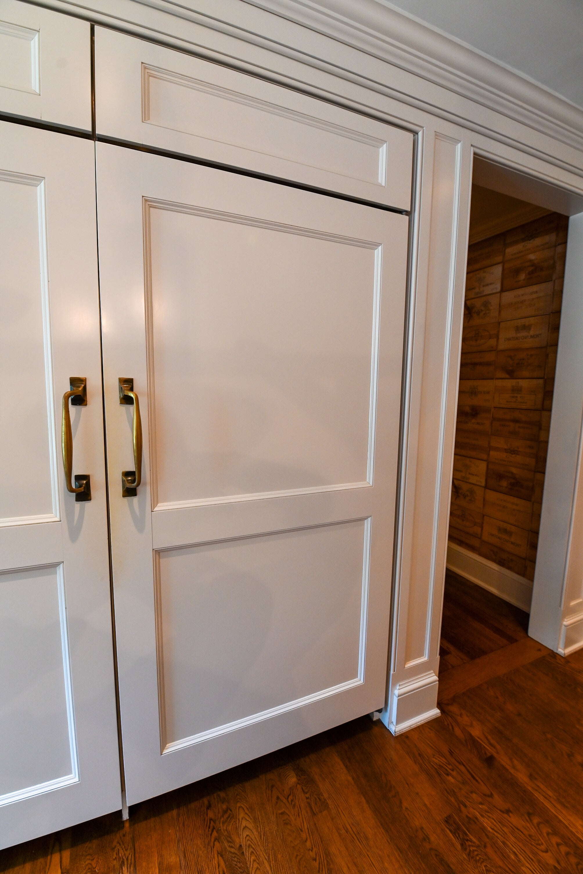 "The Montclair" Transitional White Kitchen with Island & Wolf 48" Range