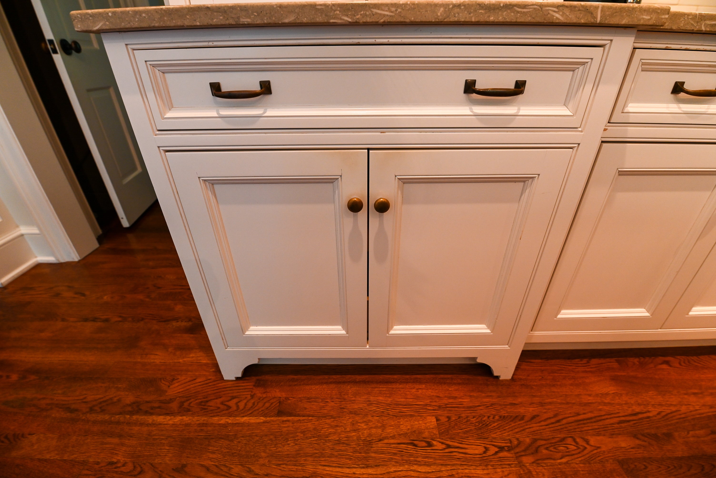 "The Montclair" Transitional White Kitchen with Island & Wolf 48" Range