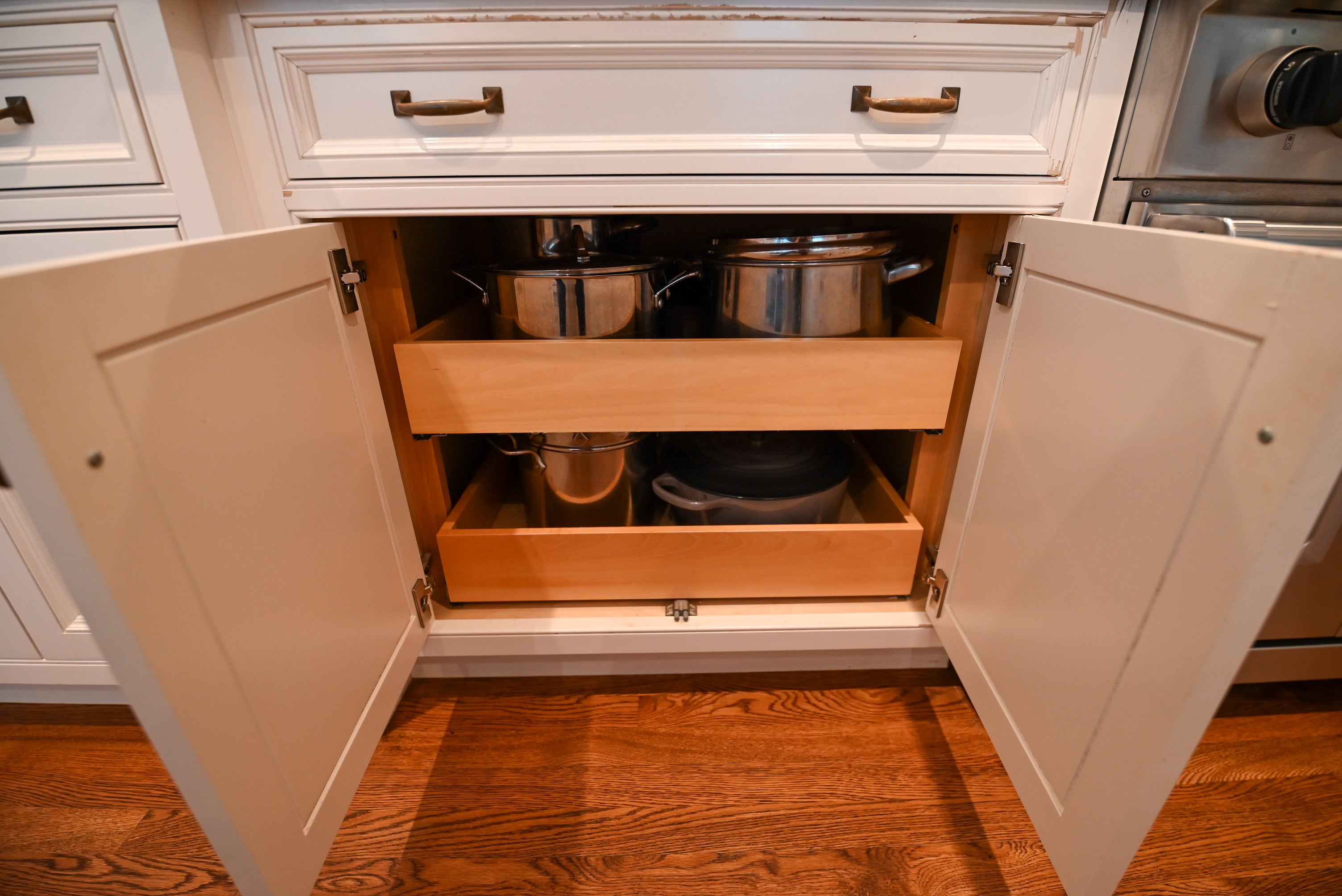 "The Montclair" Transitional White Kitchen with Island & Wolf 48" Range